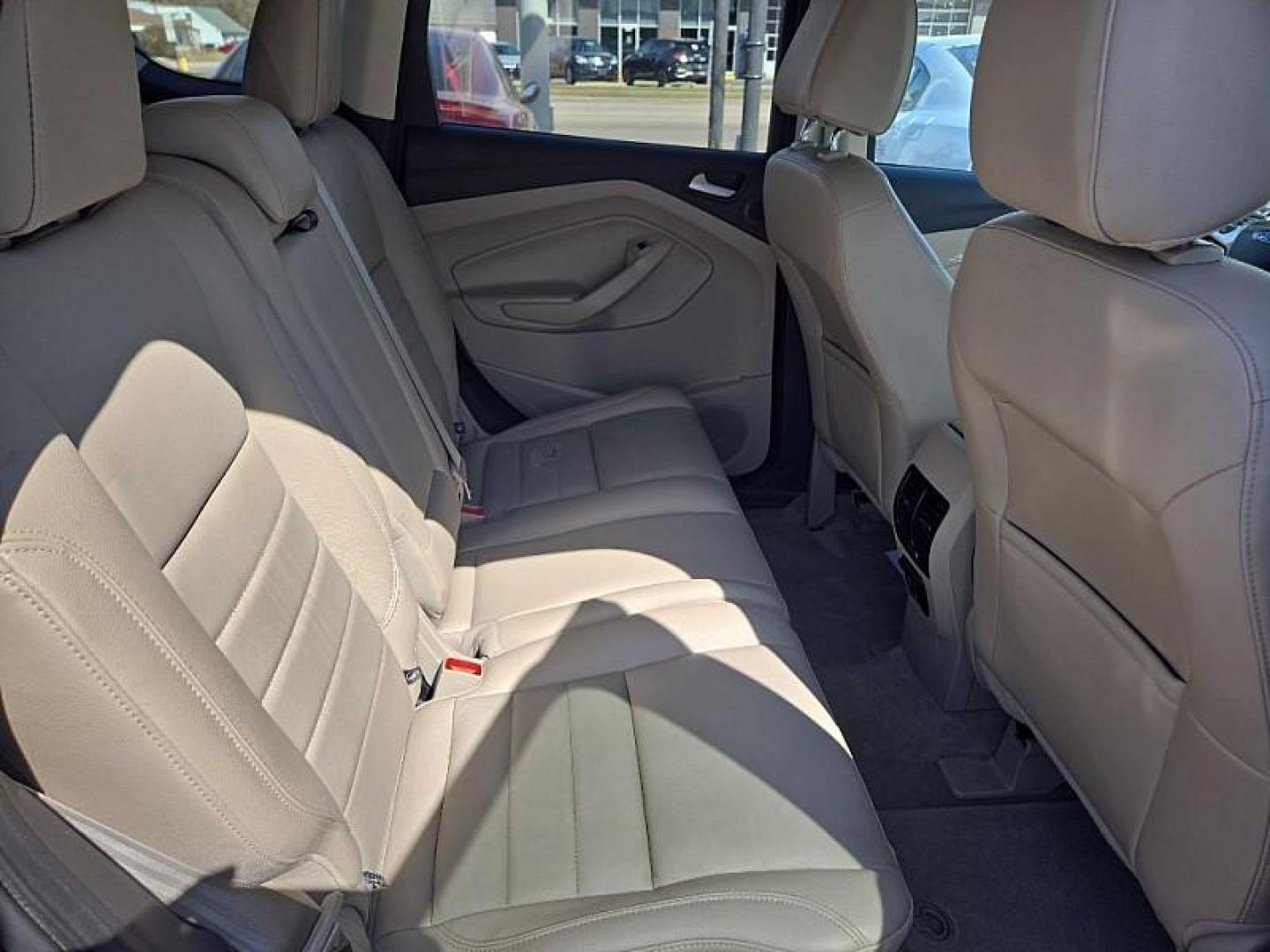 2014 ORANGE /TAN Ford Escape Titanium 4WD (1FMCU9J98EU) with an 2.0L L4 DOHC 16V engine, 6-Speed Automatic transmission, located at 3304 Woodville Road, Northwood, OH, 43619, (419) 210-8019, 41.612694, -83.480743 - Your #1 Destination for Auto Loans and mdash;No Matter Your Credit!At our dealership, we believe everyone deserves the opportunity to drive their dream car and mdash;whether you have good credit, bad credit, or no credit at all. With a wide selection of hundreds of cars, trucks, and SUVs, you'll fin - Photo#14