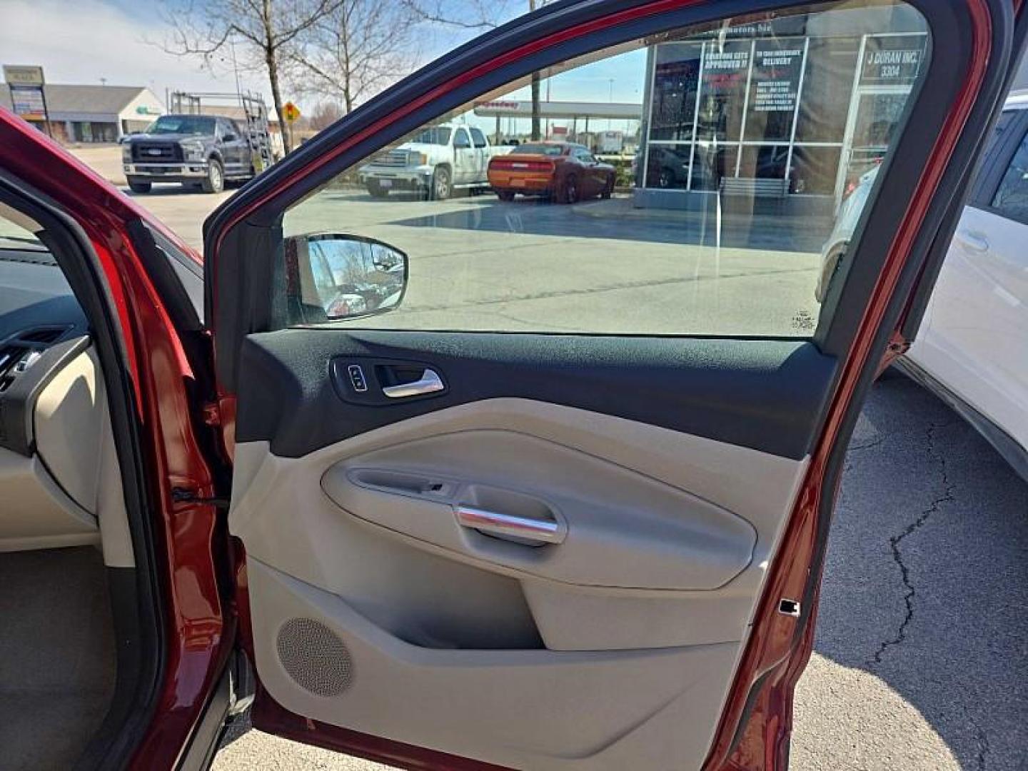 2014 ORANGE /TAN Ford Escape Titanium 4WD (1FMCU9J98EU) with an 2.0L L4 DOHC 16V engine, 6-Speed Automatic transmission, located at 3304 Woodville Road, Northwood, OH, 43619, (419) 210-8019, 41.612694, -83.480743 - Your #1 Destination for Auto Loans and mdash;No Matter Your Credit!At our dealership, we believe everyone deserves the opportunity to drive their dream car and mdash;whether you have good credit, bad credit, or no credit at all. With a wide selection of hundreds of cars, trucks, and SUVs, you'll fin - Photo#15