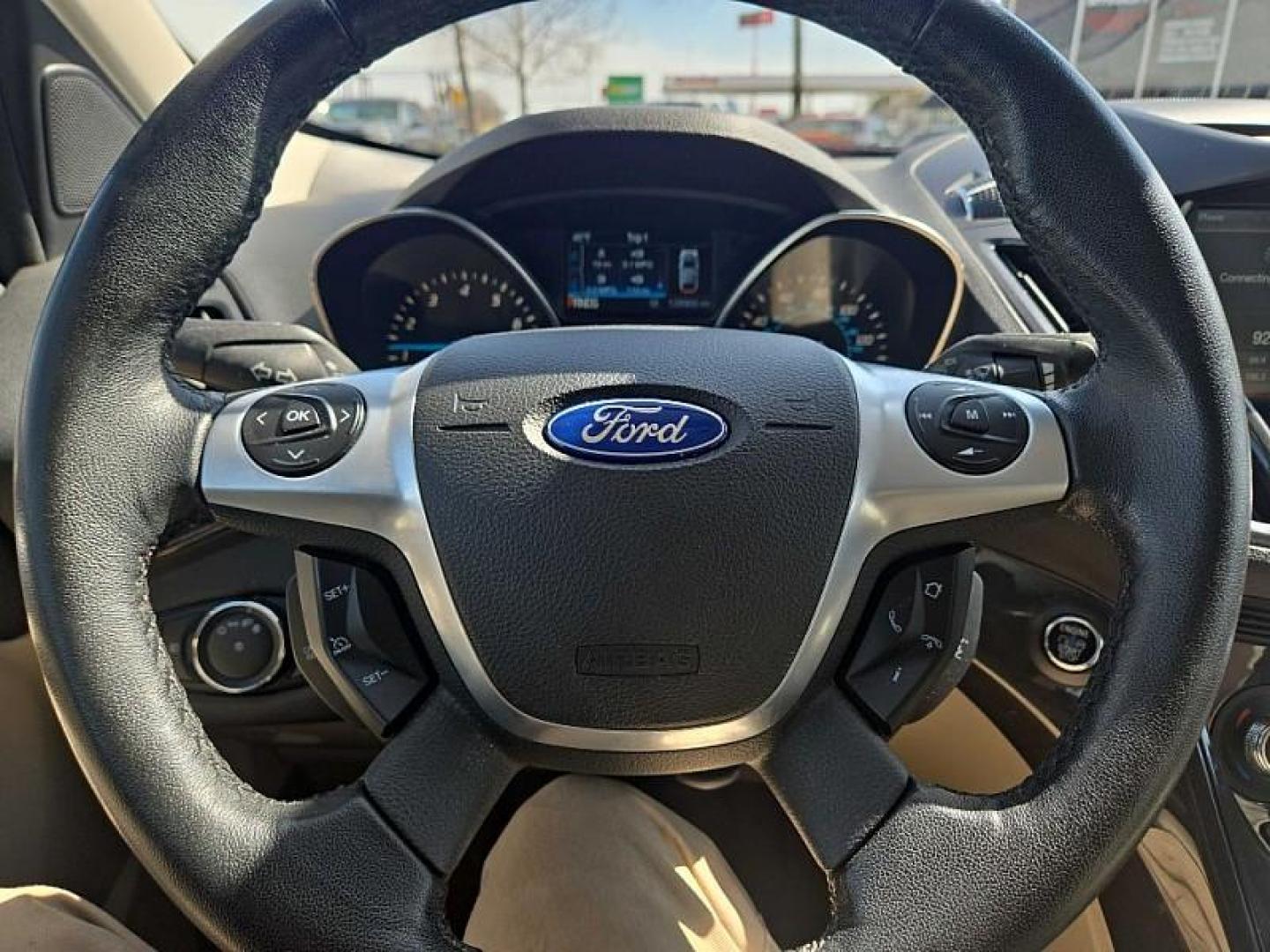 2014 ORANGE /TAN Ford Escape Titanium 4WD (1FMCU9J98EU) with an 2.0L L4 DOHC 16V engine, 6-Speed Automatic transmission, located at 3304 Woodville Road, Northwood, OH, 43619, (419) 210-8019, 41.612694, -83.480743 - Your #1 Destination for Auto Loans and mdash;No Matter Your Credit!At our dealership, we believe everyone deserves the opportunity to drive their dream car and mdash;whether you have good credit, bad credit, or no credit at all. With a wide selection of hundreds of cars, trucks, and SUVs, you'll fin - Photo#18