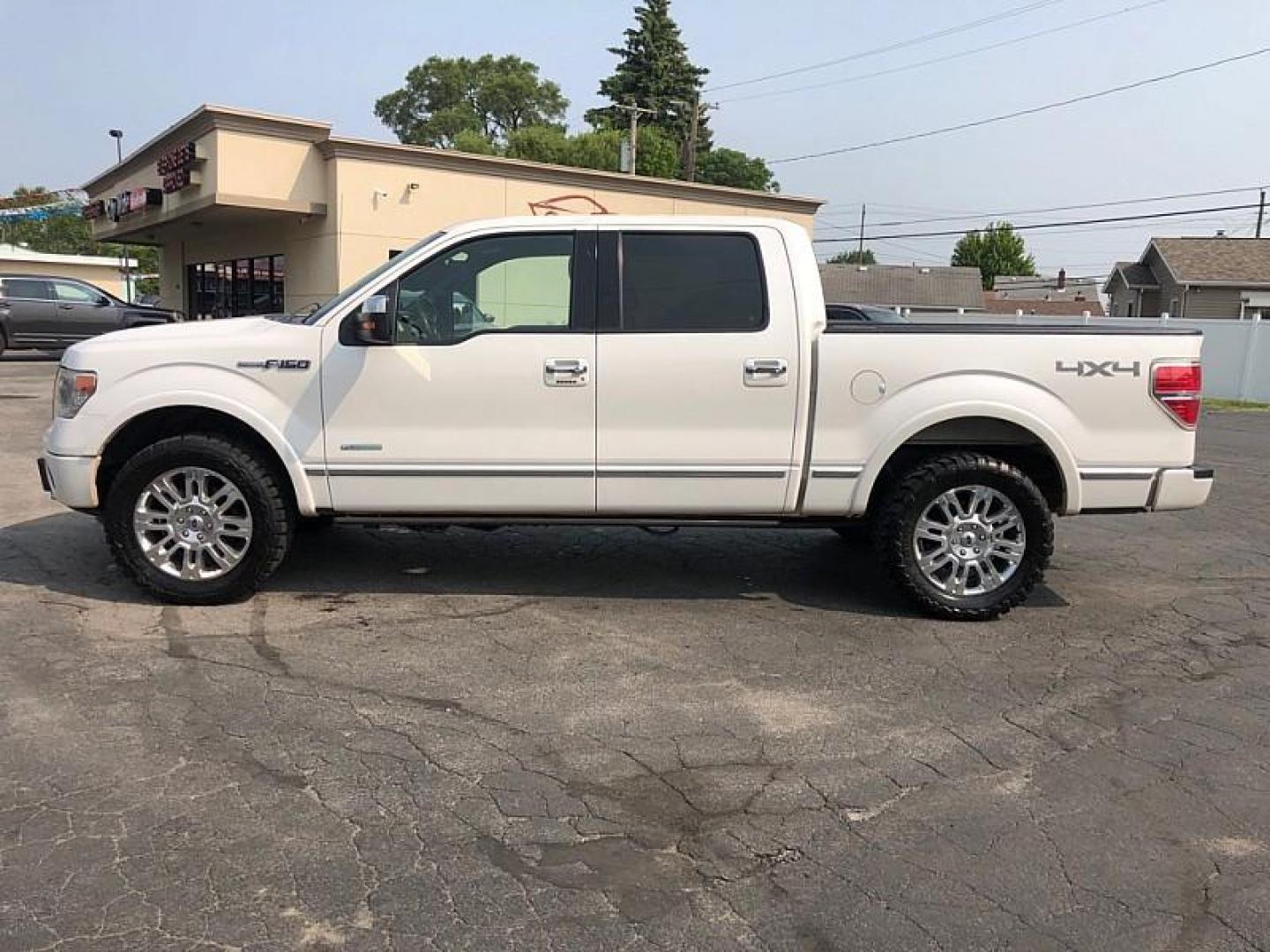 2014 WHITE /BROWN Ford F-150 FX4 SuperCrew 5.5-ft. Bed 4WD (1FTFW1ET1EF) with an 3.5L V6 TURBO engine, 6-Speed Automatic transmission, located at 3304 Woodville Road, Northwood, OH, 43619, (419) 210-8019, 41.612694, -83.480743 - Your #1 Destination for Auto Loans and mdash;No Matter Your Credit!At our dealership, we believe everyone deserves the opportunity to drive their dream car and mdash;whether you have good credit, bad credit, or no credit at all. With a wide selection of hundreds of cars, trucks, and SUVs, you'll fin - Photo#1