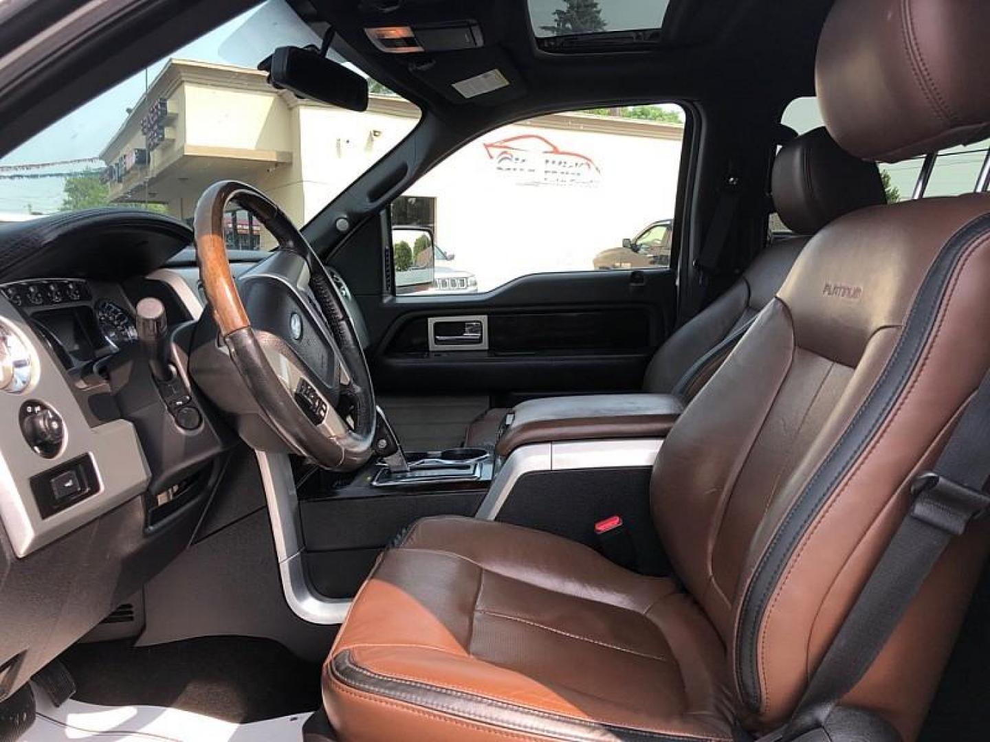 2014 WHITE /BROWN Ford F-150 FX4 SuperCrew 5.5-ft. Bed 4WD (1FTFW1ET1EF) with an 3.5L V6 TURBO engine, 6-Speed Automatic transmission, located at 3304 Woodville Road, Northwood, OH, 43619, (419) 210-8019, 41.612694, -83.480743 - Your #1 Destination for Auto Loans and mdash;No Matter Your Credit!At our dealership, we believe everyone deserves the opportunity to drive their dream car and mdash;whether you have good credit, bad credit, or no credit at all. With a wide selection of hundreds of cars, trucks, and SUVs, you'll fin - Photo#9