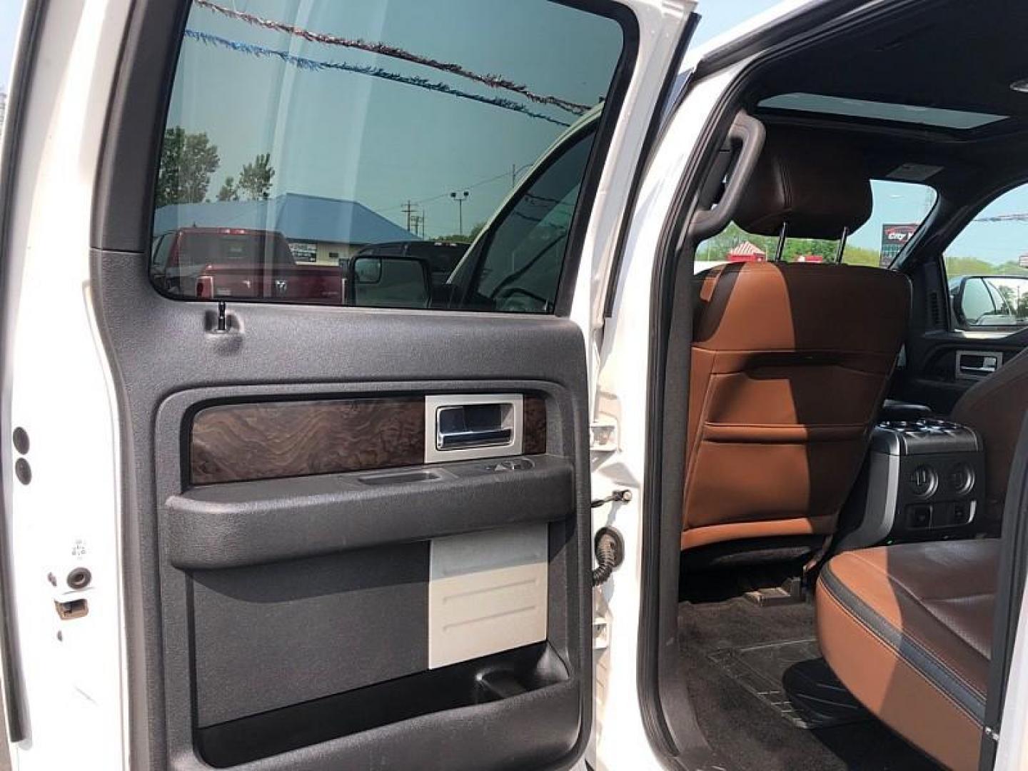 2014 WHITE /BROWN Ford F-150 FX4 SuperCrew 5.5-ft. Bed 4WD (1FTFW1ET1EF) with an 3.5L V6 TURBO engine, 6-Speed Automatic transmission, located at 3304 Woodville Road, Northwood, OH, 43619, (419) 210-8019, 41.612694, -83.480743 - Your #1 Destination for Auto Loans and mdash;No Matter Your Credit!At our dealership, we believe everyone deserves the opportunity to drive their dream car and mdash;whether you have good credit, bad credit, or no credit at all. With a wide selection of hundreds of cars, trucks, and SUVs, you'll fin - Photo#10