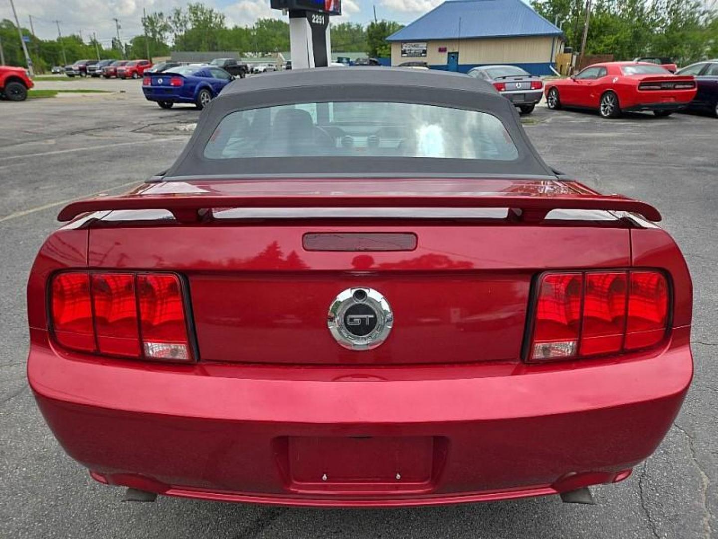 2006 RED /BLACK Ford Mustang GT Deluxe Convertible (1ZVFT85H365) with an 4.6L V8 SOHC 24V engine, Automatic transmission, located at 3304 Woodville Road, Northwood, OH, 43619, (419) 210-8019, 41.612694, -83.480743 - Your #1 Destination for Auto Loans and mdash;No Matter Your Credit!At our dealership, we believe everyone deserves the opportunity to drive their dream car and mdash;whether you have good credit, bad credit, or no credit at all. With a wide selection of hundreds of cars, trucks, and SUVs, you'll fin - Photo#2