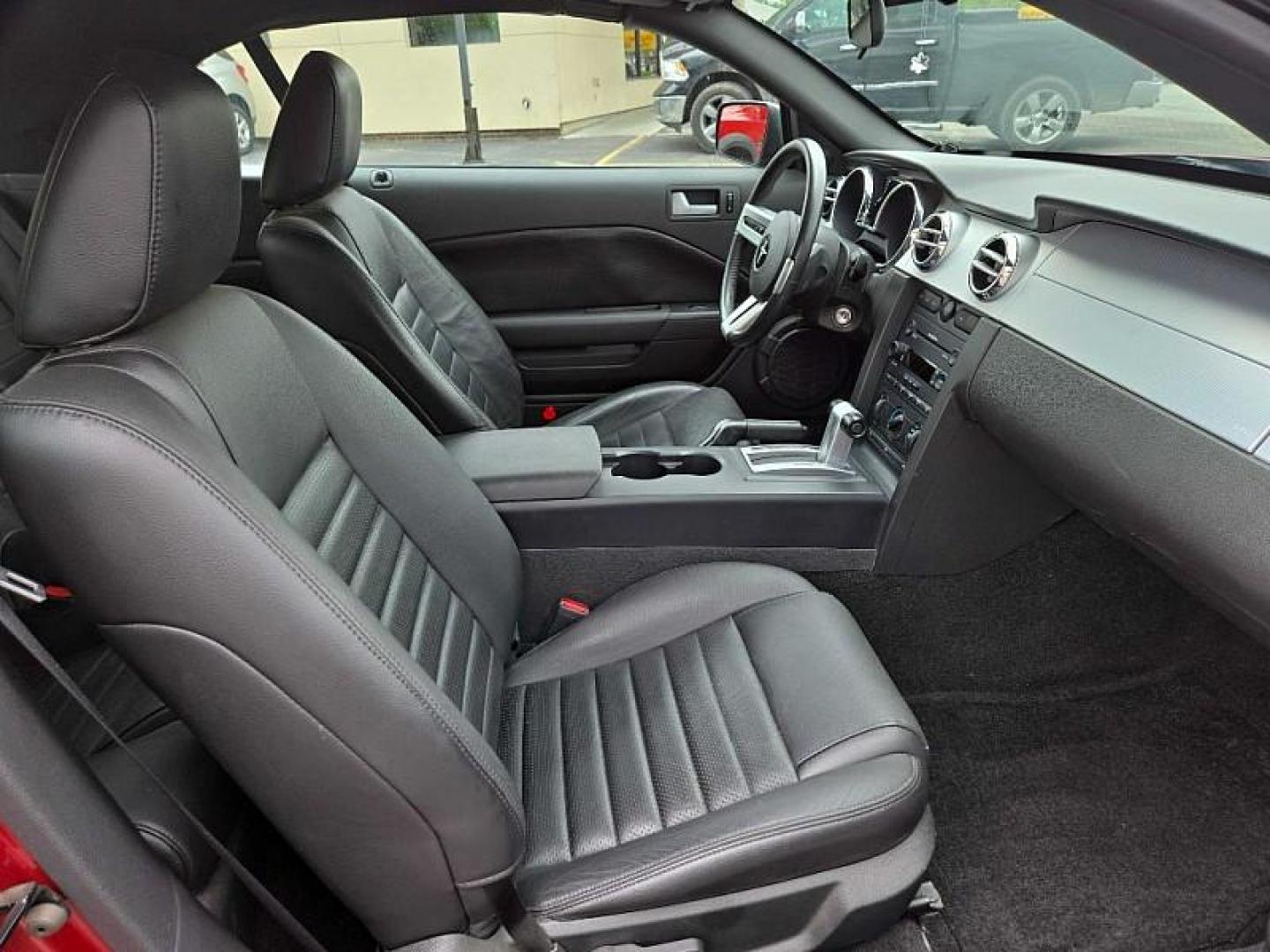 2006 RED /BLACK Ford Mustang GT Deluxe Convertible (1ZVFT85H365) with an 4.6L V8 SOHC 24V engine, Automatic transmission, located at 3304 Woodville Road, Northwood, OH, 43619, (419) 210-8019, 41.612694, -83.480743 - Your #1 Destination for Auto Loans and mdash;No Matter Your Credit!At our dealership, we believe everyone deserves the opportunity to drive their dream car and mdash;whether you have good credit, bad credit, or no credit at all. With a wide selection of hundreds of cars, trucks, and SUVs, you'll fin - Photo#12