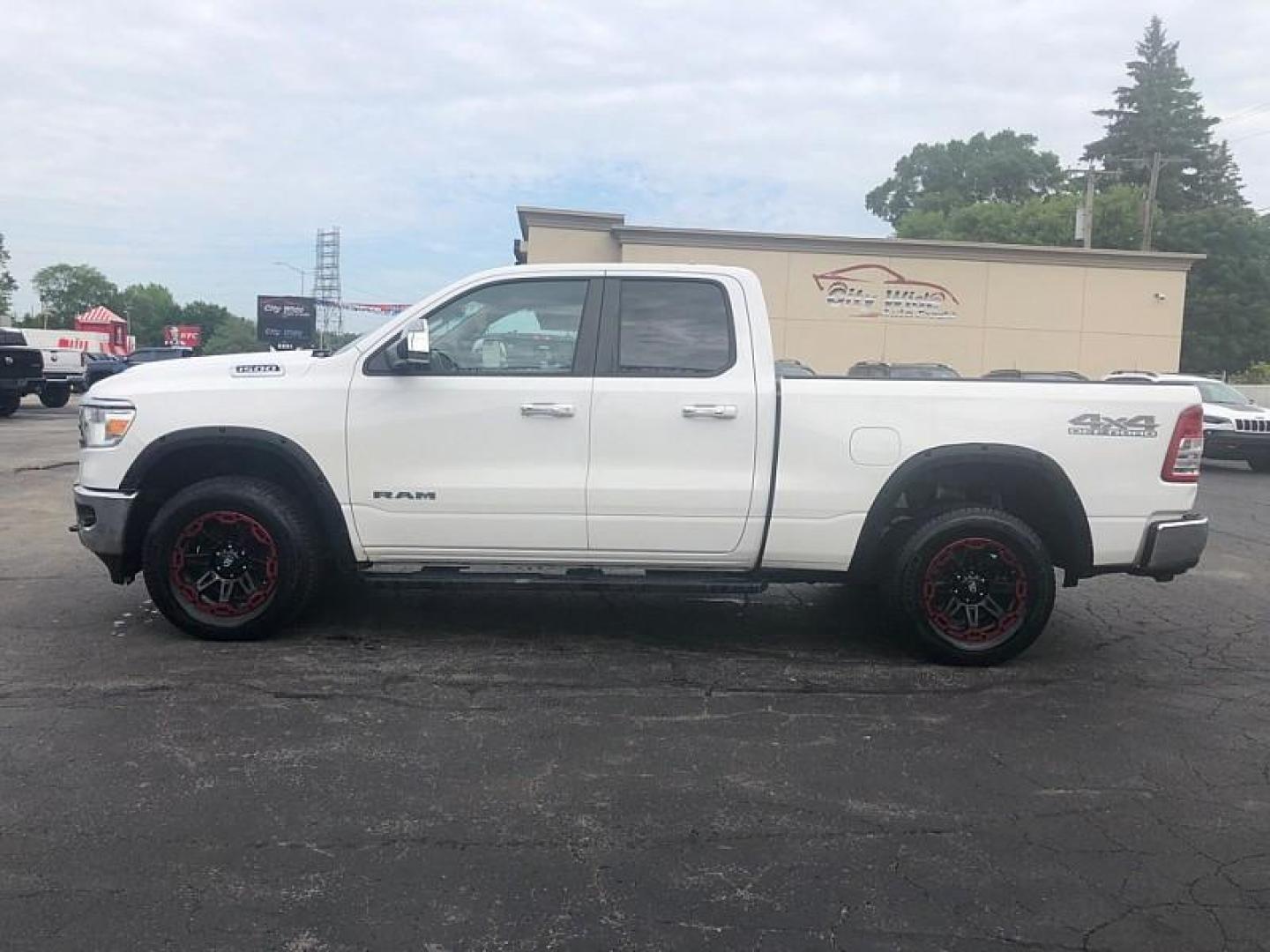 2020 WHITE /BLACK RAM 1500 Big Horn Quad Cab 4WD (1C6RRFBG9LN) with an 3.6L V6 DOHC 24V engine, 8A transmission, located at 3304 Woodville Road, Northwood, OH, 43619, (419) 210-8019, 41.612694, -83.480743 - Your #1 Destination for Auto Loans and mdash;No Matter Your Credit!At our dealership, we believe everyone deserves the opportunity to drive their dream car and mdash;whether you have good credit, bad credit, or no credit at all. With a wide selection of hundreds of cars, trucks, and SUVs, you'll fin - Photo#1