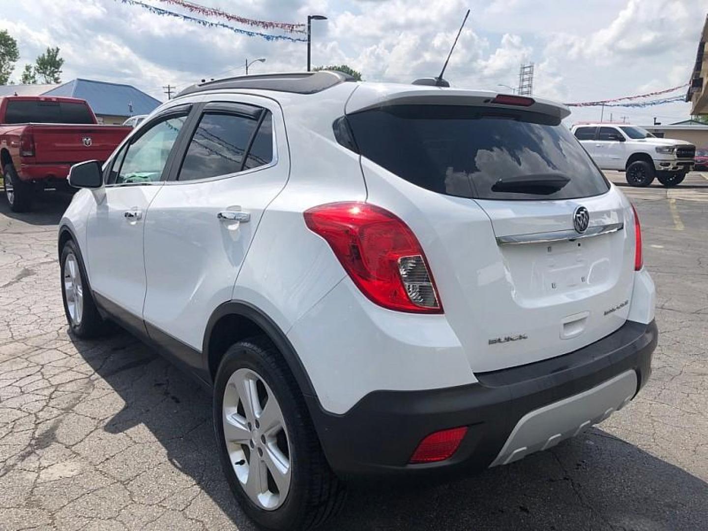 2016 WHITE /GRAY Buick Encore Base FWD (KL4CJASB5GB) with an 1.4L L4 DOHC 16V TURBO engine, 6A transmission, located at 3304 Woodville Road, Northwood, OH, 43619, (419) 210-8019, 41.612694, -83.480743 - Your #1 Destination for Auto Loans and mdash;No Matter Your Credit!At our dealership, we believe everyone deserves the opportunity to drive their dream car and mdash;whether you have good credit, bad credit, or no credit at all. With a wide selection of hundreds of cars, trucks, and SUVs, you'll fin - Photo#2