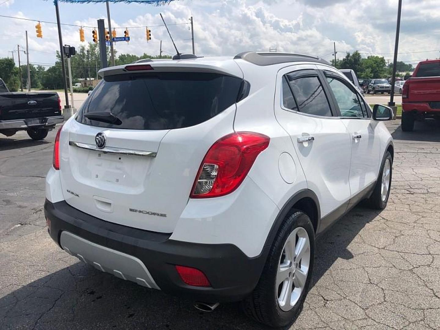 2016 WHITE /GRAY Buick Encore Base FWD (KL4CJASB5GB) with an 1.4L L4 DOHC 16V TURBO engine, 6A transmission, located at 3304 Woodville Road, Northwood, OH, 43619, (419) 210-8019, 41.612694, -83.480743 - Your #1 Destination for Auto Loans and mdash;No Matter Your Credit!At our dealership, we believe everyone deserves the opportunity to drive their dream car and mdash;whether you have good credit, bad credit, or no credit at all. With a wide selection of hundreds of cars, trucks, and SUVs, you'll fin - Photo#4