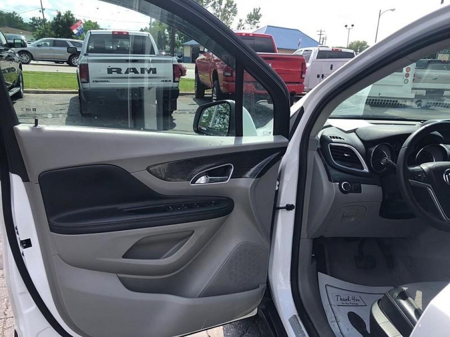 2016 WHITE /GRAY Buick Encore Base FWD (KL4CJASB5GB) with an 1.4L L4 DOHC 16V TURBO engine, 6A transmission, located at 3304 Woodville Road, Northwood, OH, 43619, (419) 210-8019, 41.612694, -83.480743 - Your #1 Destination for Auto Loans and mdash;No Matter Your Credit!At our dealership, we believe everyone deserves the opportunity to drive their dream car and mdash;whether you have good credit, bad credit, or no credit at all. With a wide selection of hundreds of cars, trucks, and SUVs, you'll fin - Photo#8