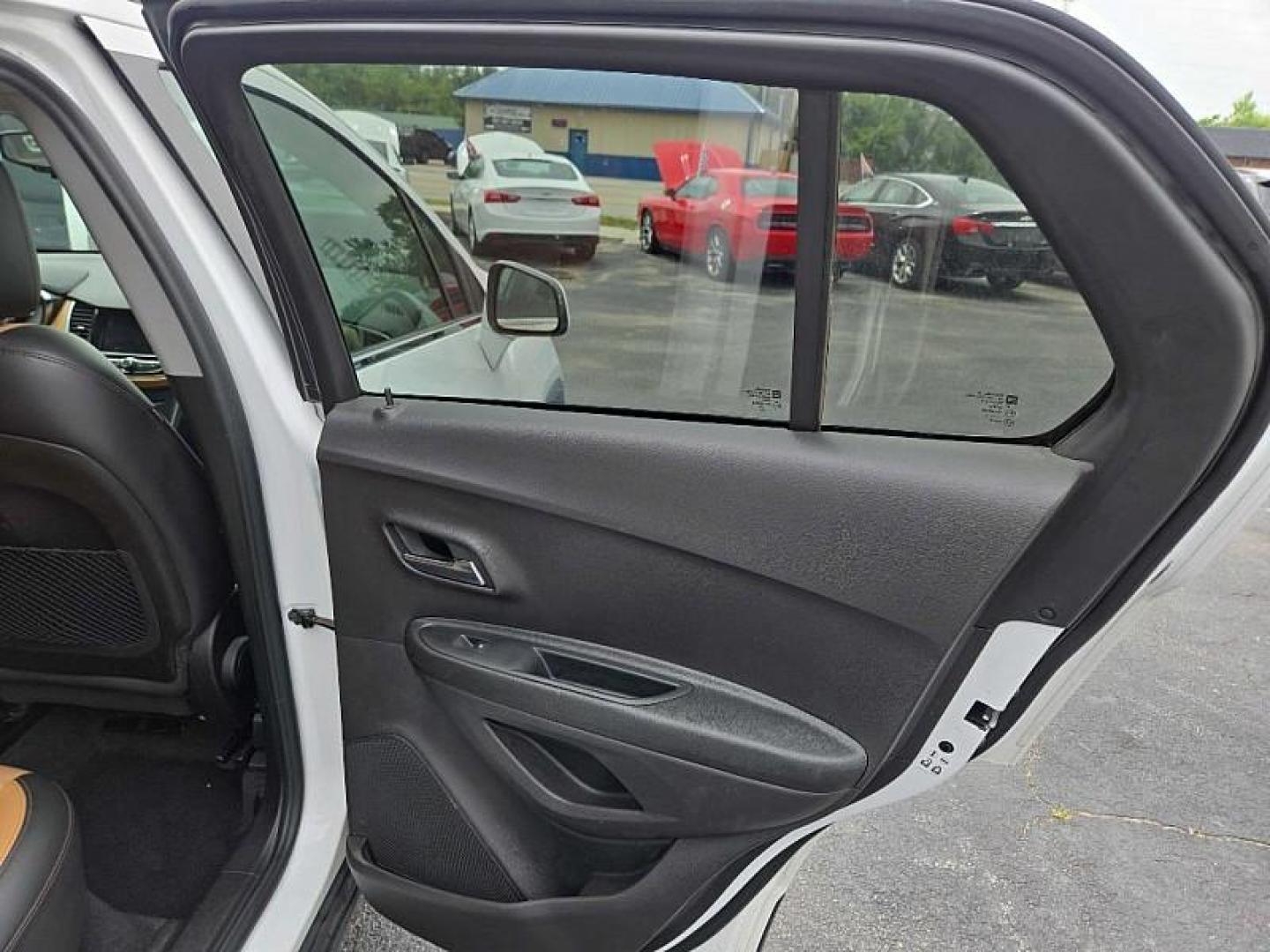 2020 White /BROWN Chevrolet Trax LT AWD (3GNCJPSB9LL) with an 1.4L L4 DOHC 16V engine, 6A transmission, located at 3304 Woodville Road, Northwood, OH, 43619, (419) 210-8019, 41.612694, -83.480743 - Your #1 Destination for Auto Loans and mdash;No Matter Your Credit!At our dealership, we believe everyone deserves the opportunity to drive their dream car and mdash;whether you have good credit, bad credit, or no credit at all. With a wide selection of hundreds of cars, trucks, and SUVs, you'll fin - Photo#13