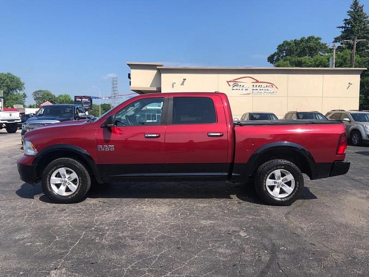 2014 RED /GRAY RAM 1500 SLT Crew Cab SWB 4WD (1C6RR7LG0ES) with an 3.6L V6 DOHC 24V FFV engine, 6-Speed Automatic transmission, located at 3304 Woodville Road, Northwood, OH, 43619, (419) 210-8019, 41.612694, -83.480743 - Your #1 Destination for Auto Loans and mdash;No Matter Your Credit!At our dealership, we believe everyone deserves the opportunity to drive their dream car and mdash;whether you have good credit, bad credit, or no credit at all. With a wide selection of hundreds of cars, trucks, and SUVs, you'll fin - Photo#1