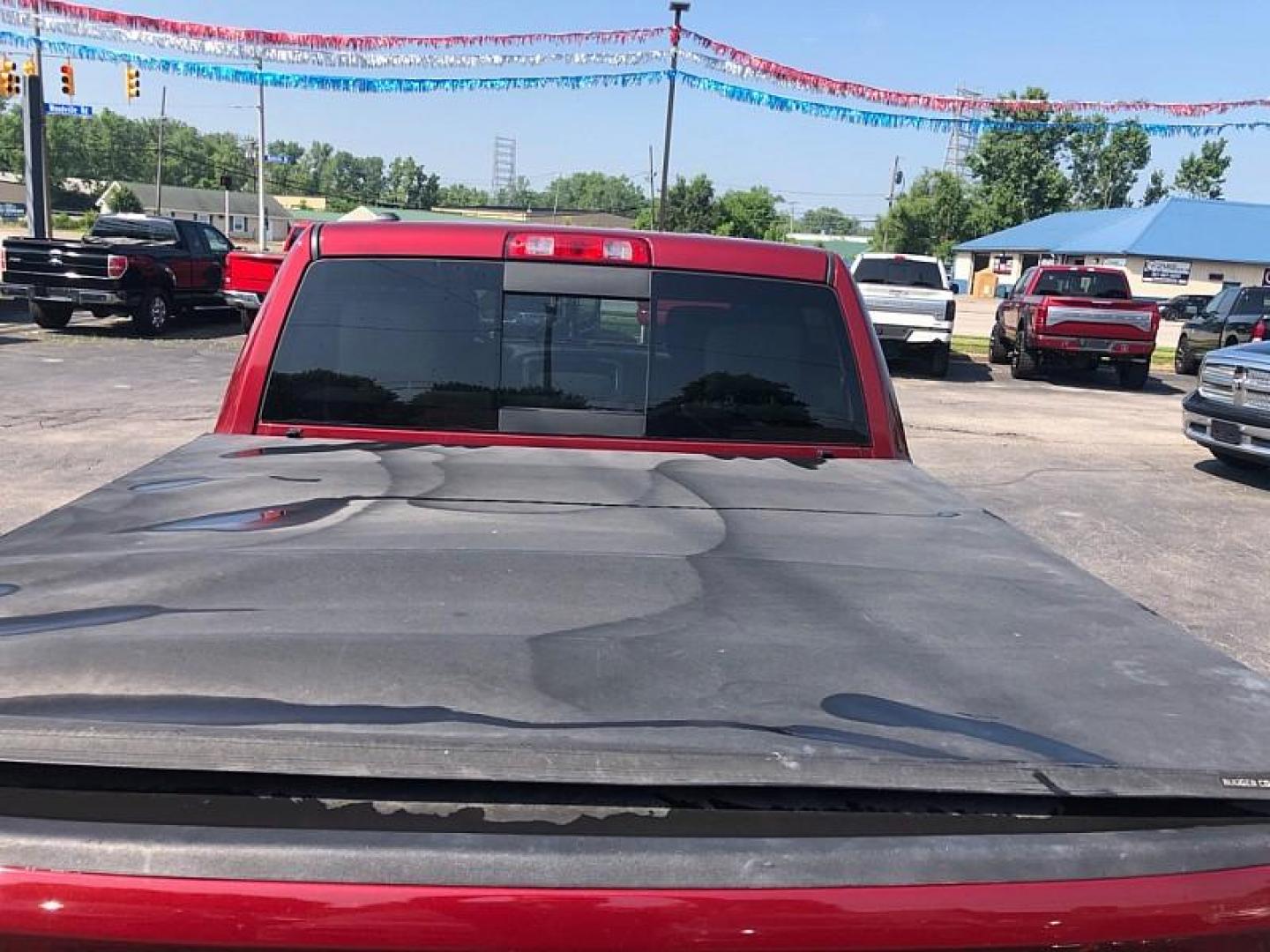 2014 RED /GRAY RAM 1500 SLT Crew Cab SWB 4WD (1C6RR7LG0ES) with an 3.6L V6 DOHC 24V FFV engine, 6-Speed Automatic transmission, located at 3304 Woodville Road, Northwood, OH, 43619, (419) 210-8019, 41.612694, -83.480743 - Your #1 Destination for Auto Loans and mdash;No Matter Your Credit!At our dealership, we believe everyone deserves the opportunity to drive their dream car and mdash;whether you have good credit, bad credit, or no credit at all. With a wide selection of hundreds of cars, trucks, and SUVs, you'll fin - Photo#12