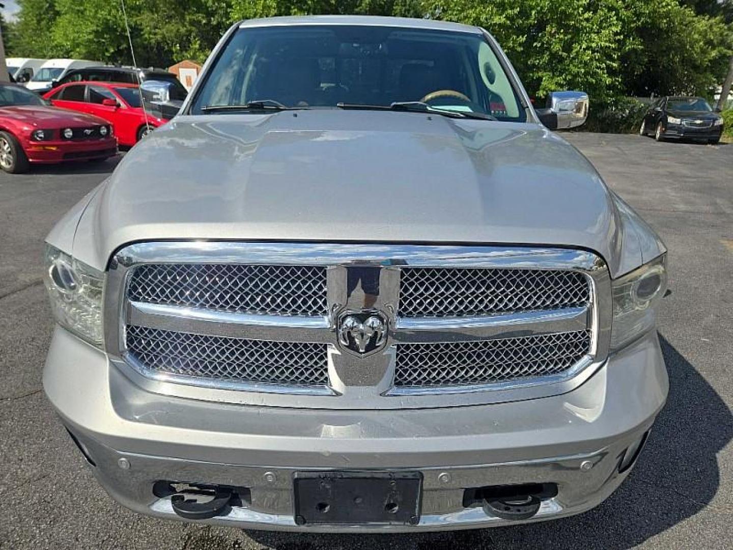 2014 SILVER /BROWN RAM 1500 Laramie Longhorn Edition Crew Cab LWB 4WD (1C6RR7WTXES) with an 5.7L V8 OHV 16V engine, 6-Speed Automatic transmission, located at 3304 Woodville Road, Northwood, OH, 43619, (419) 210-8019, 41.612694, -83.480743 - Your #1 Destination for Auto Loans and mdash;No Matter Your Credit!At our dealership, we believe everyone deserves the opportunity to drive their dream car and mdash;whether you have good credit, bad credit, or no credit at all. With a wide selection of hundreds of cars, trucks, and SUVs, you'll fin - Photo#7