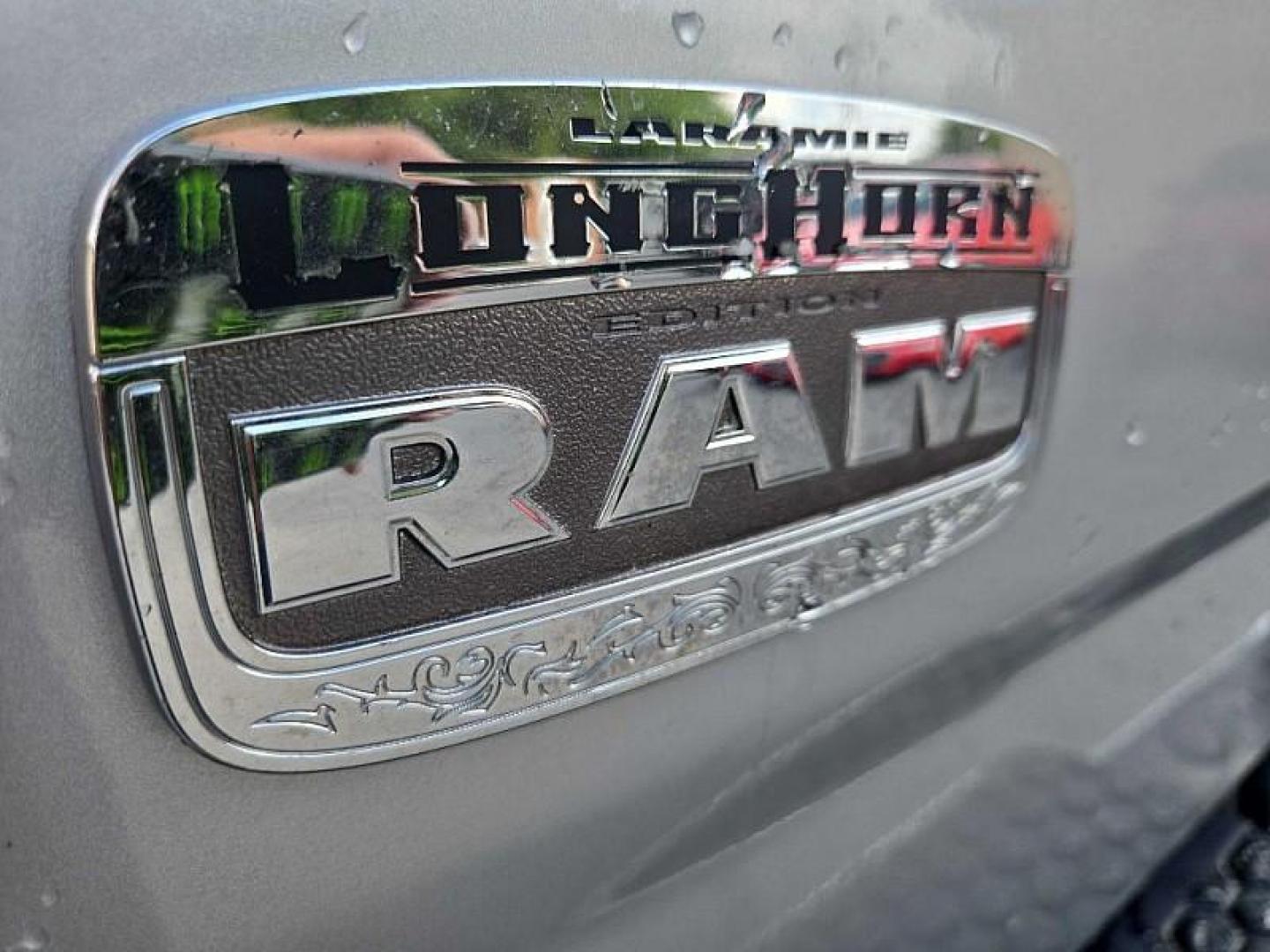 2014 SILVER /BROWN RAM 1500 Laramie Longhorn Edition Crew Cab LWB 4WD (1C6RR7WTXES) with an 5.7L V8 OHV 16V engine, 6-Speed Automatic transmission, located at 3304 Woodville Road, Northwood, OH, 43619, (419) 210-8019, 41.612694, -83.480743 - Your #1 Destination for Auto Loans and mdash;No Matter Your Credit!At our dealership, we believe everyone deserves the opportunity to drive their dream car and mdash;whether you have good credit, bad credit, or no credit at all. With a wide selection of hundreds of cars, trucks, and SUVs, you'll fin - Photo#13