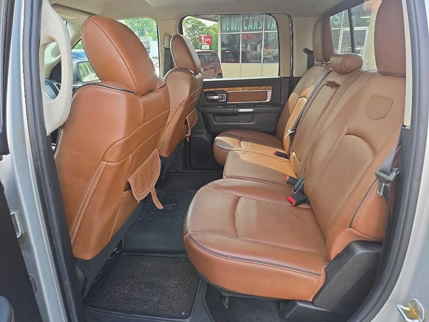 2014 SILVER /BROWN RAM 1500 Laramie Longhorn Edition Crew Cab LWB 4WD (1C6RR7WTXES) with an 5.7L V8 OHV 16V engine, 6-Speed Automatic transmission, located at 3304 Woodville Road, Northwood, OH, 43619, (419) 210-8019, 41.612694, -83.480743 - Your #1 Destination for Auto Loans and mdash;No Matter Your Credit!At our dealership, we believe everyone deserves the opportunity to drive their dream car and mdash;whether you have good credit, bad credit, or no credit at all. With a wide selection of hundreds of cars, trucks, and SUVs, you'll fin - Photo#11