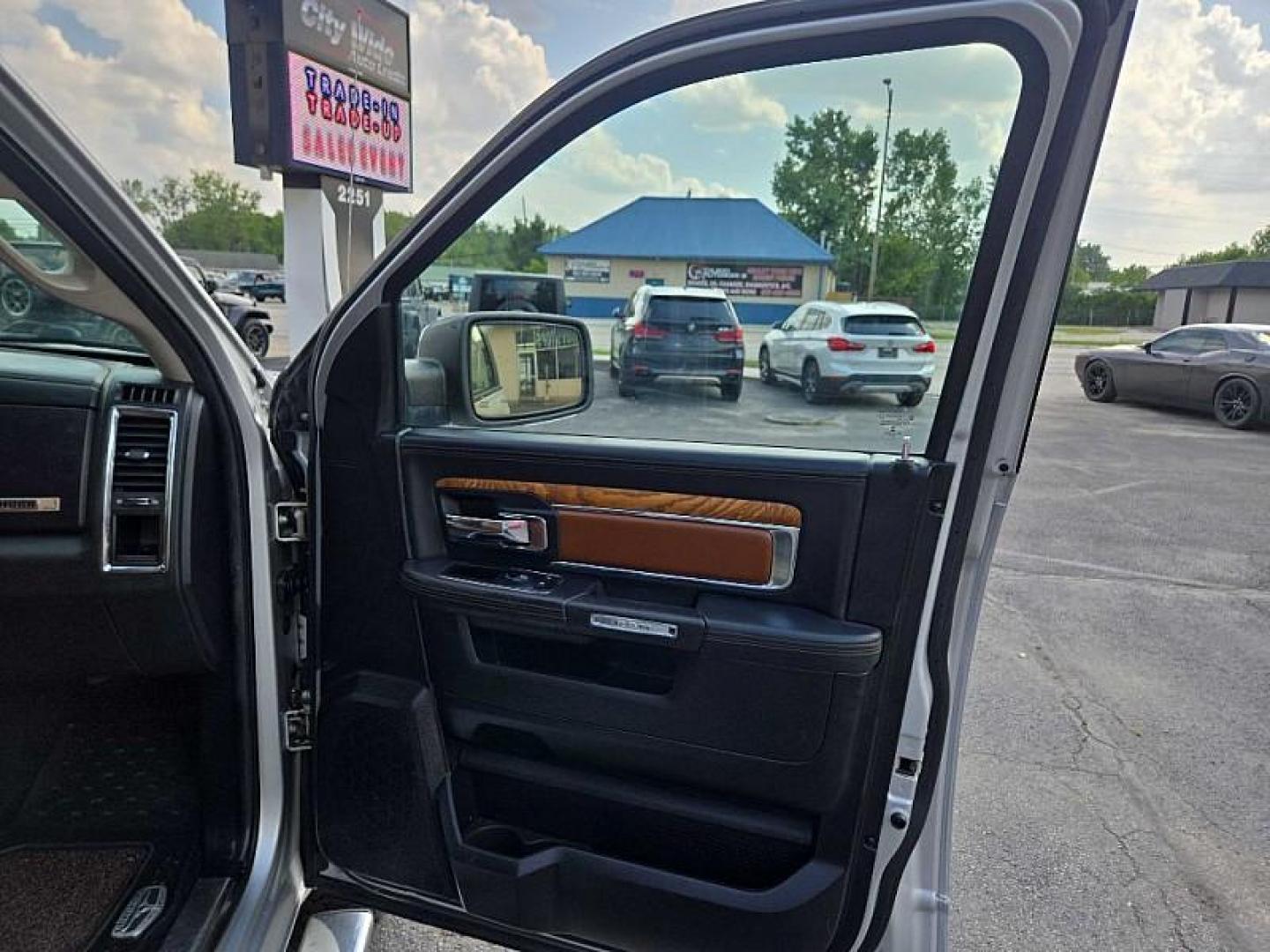 2014 SILVER /BROWN RAM 1500 Laramie Longhorn Edition Crew Cab LWB 4WD (1C6RR7WTXES) with an 5.7L V8 OHV 16V engine, 6-Speed Automatic transmission, located at 3304 Woodville Road, Northwood, OH, 43619, (419) 210-8019, 41.612694, -83.480743 - Your #1 Destination for Auto Loans and mdash;No Matter Your Credit!At our dealership, we believe everyone deserves the opportunity to drive their dream car and mdash;whether you have good credit, bad credit, or no credit at all. With a wide selection of hundreds of cars, trucks, and SUVs, you'll fin - Photo#17