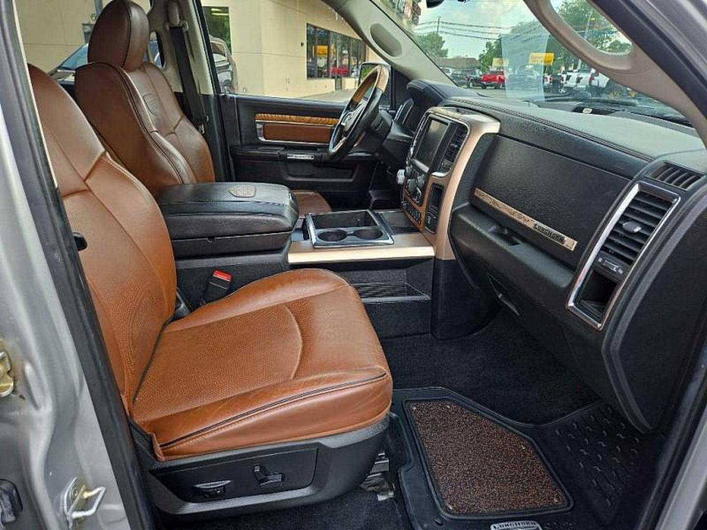 2014 SILVER /BROWN RAM 1500 Laramie Longhorn Edition Crew Cab LWB 4WD (1C6RR7WTXES) with an 5.7L V8 OHV 16V engine, 6-Speed Automatic transmission, located at 3304 Woodville Road, Northwood, OH, 43619, (419) 210-8019, 41.612694, -83.480743 - Your #1 Destination for Auto Loans and mdash;No Matter Your Credit!At our dealership, we believe everyone deserves the opportunity to drive their dream car and mdash;whether you have good credit, bad credit, or no credit at all. With a wide selection of hundreds of cars, trucks, and SUVs, you'll fin - Photo#18