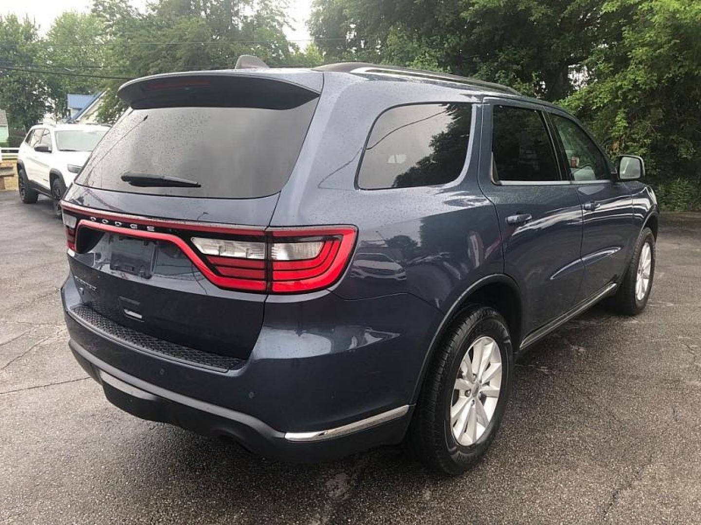 2021 BLUE /BLACK Dodge Durango SXT AWD (1C4RDJAGXMC) with an 3.6L V6 DOHC 24V engine, 8A transmission, located at 3304 Woodville Road, Northwood, OH, 43619, (419) 210-8019, 41.612694, -83.480743 - Your #1 Destination for Auto Loans and mdash;No Matter Your Credit!At our dealership, we believe everyone deserves the opportunity to drive their dream car and mdash;whether you have good credit, bad credit, or no credit at all. With a wide selection of hundreds of cars, trucks, and SUVs, you'll fin - Photo#4