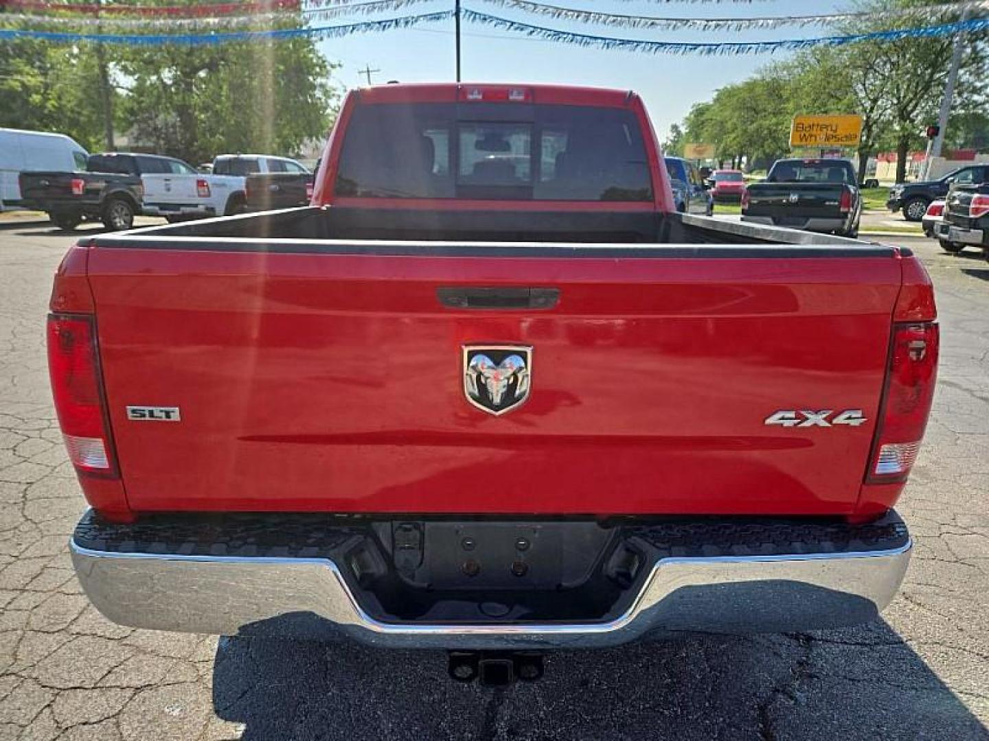 2016 RED /BLACK RAM 1500 SLT Quad Cab 4WD (1C6RR7GT4GS) with an 5.7L V8 OHV 16V engine, 6A transmission, located at 3304 Woodville Road, Northwood, OH, 43619, (419) 210-8019, 41.612694, -83.480743 - Your #1 Destination for Auto Loans and mdash;No Matter Your Credit!At our dealership, we believe everyone deserves the opportunity to drive their dream car and mdash;whether you have good credit, bad credit, or no credit at all. With a wide selection of hundreds of cars, trucks, and SUVs, you'll fin - Photo#3