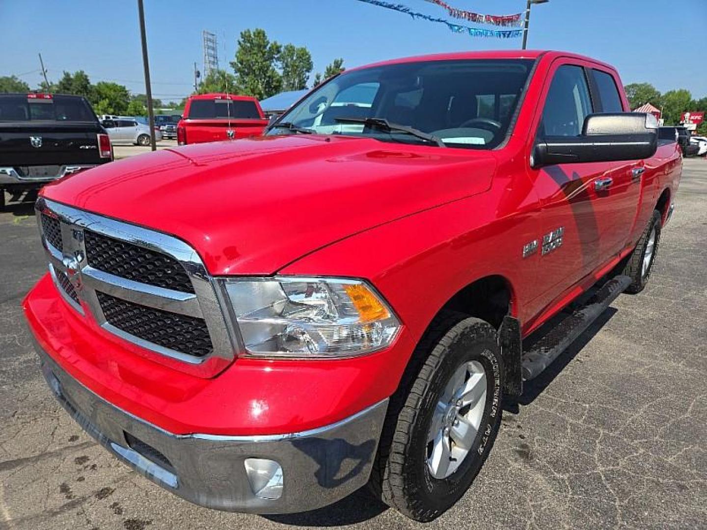 2016 RED /BLACK RAM 1500 SLT Quad Cab 4WD (1C6RR7GT4GS) with an 5.7L V8 OHV 16V engine, 6A transmission, located at 3304 Woodville Road, Northwood, OH, 43619, (419) 210-8019, 41.612694, -83.480743 - Your #1 Destination for Auto Loans and mdash;No Matter Your Credit!At our dealership, we believe everyone deserves the opportunity to drive their dream car and mdash;whether you have good credit, bad credit, or no credit at all. With a wide selection of hundreds of cars, trucks, and SUVs, you'll fin - Photo#0