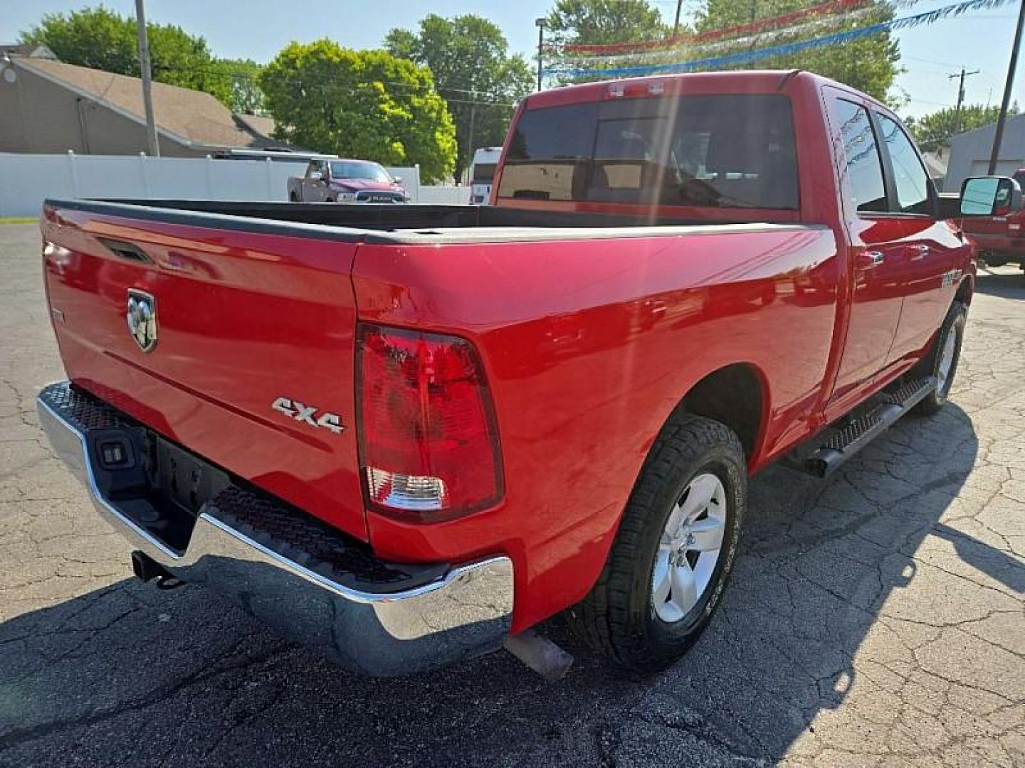 2016 RED /BLACK RAM 1500 SLT Quad Cab 4WD (1C6RR7GT4GS) with an 5.7L V8 OHV 16V engine, 6A transmission, located at 3304 Woodville Road, Northwood, OH, 43619, (419) 210-8019, 41.612694, -83.480743 - Your #1 Destination for Auto Loans and mdash;No Matter Your Credit!At our dealership, we believe everyone deserves the opportunity to drive their dream car and mdash;whether you have good credit, bad credit, or no credit at all. With a wide selection of hundreds of cars, trucks, and SUVs, you'll fin - Photo#4