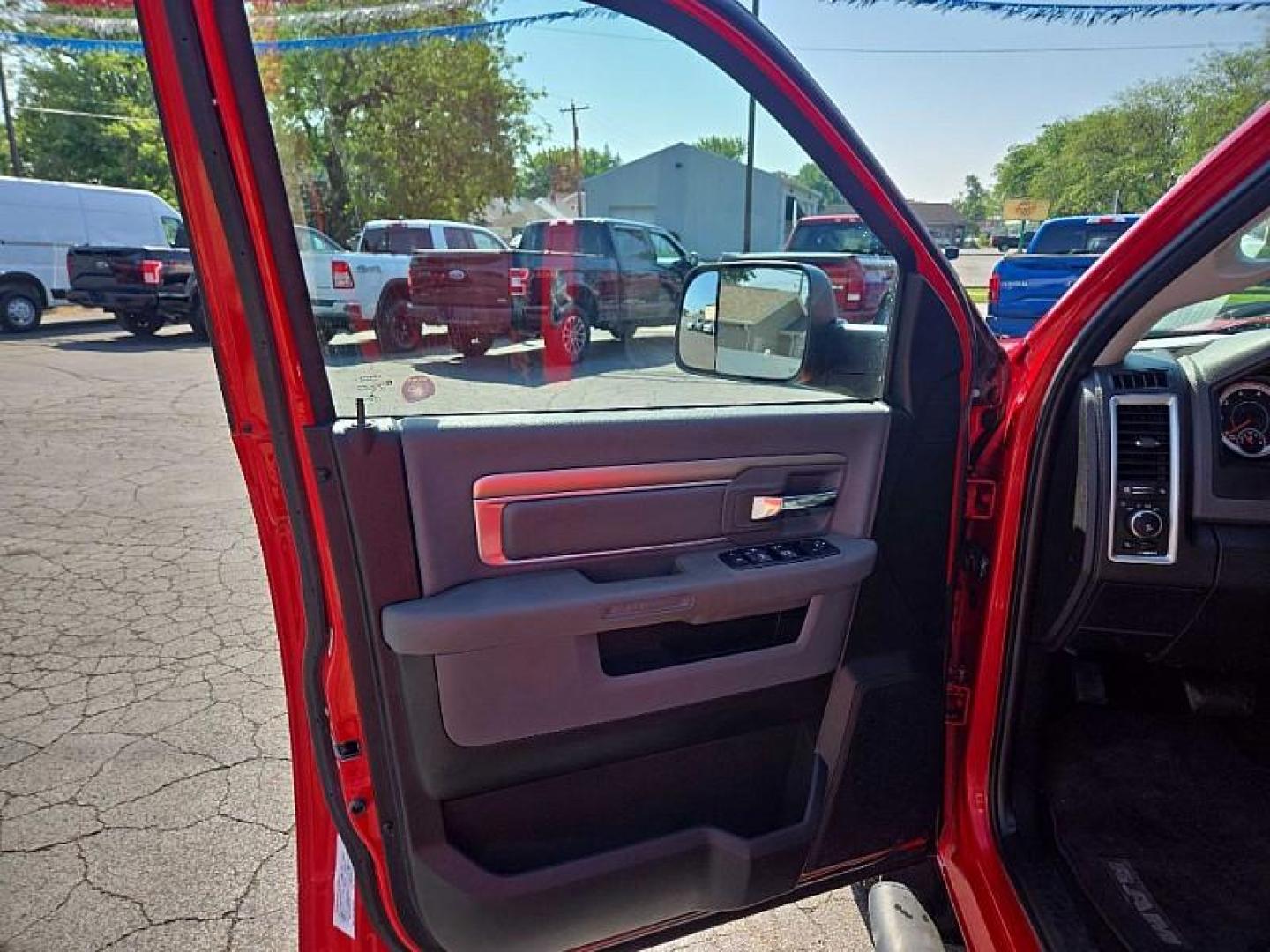 2016 RED /BLACK RAM 1500 SLT Quad Cab 4WD (1C6RR7GT4GS) with an 5.7L V8 OHV 16V engine, 6A transmission, located at 3304 Woodville Road, Northwood, OH, 43619, (419) 210-8019, 41.612694, -83.480743 - Your #1 Destination for Auto Loans and mdash;No Matter Your Credit!At our dealership, we believe everyone deserves the opportunity to drive their dream car and mdash;whether you have good credit, bad credit, or no credit at all. With a wide selection of hundreds of cars, trucks, and SUVs, you'll fin - Photo#8