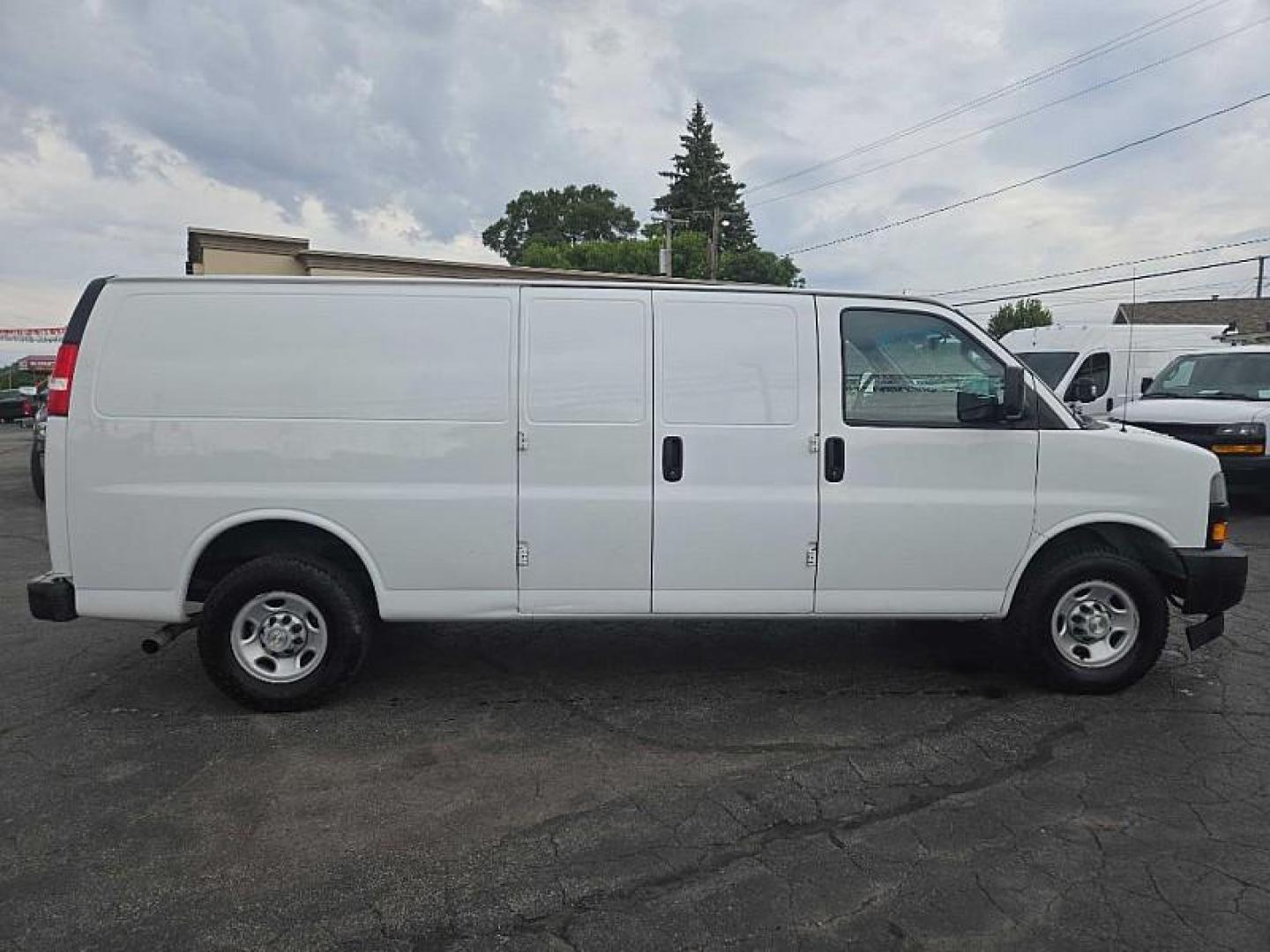 2021 WHITE Chevrolet Express 2500 Cargo Extended (1GCWGBFP5M1) with an 4.3L V6 engine, 6A transmission, located at 3304 Woodville Road, Northwood, OH, 43619, (419) 210-8019, 41.612694, -83.480743 - Your #1 Destination for Auto Loans and mdash;No Matter Your Credit!At our dealership, we believe everyone deserves the opportunity to drive their dream car and mdash;whether you have good credit, bad credit, or no credit at all. With a wide selection of hundreds of cars, trucks, and SUVs, you'll fin - Photo#4