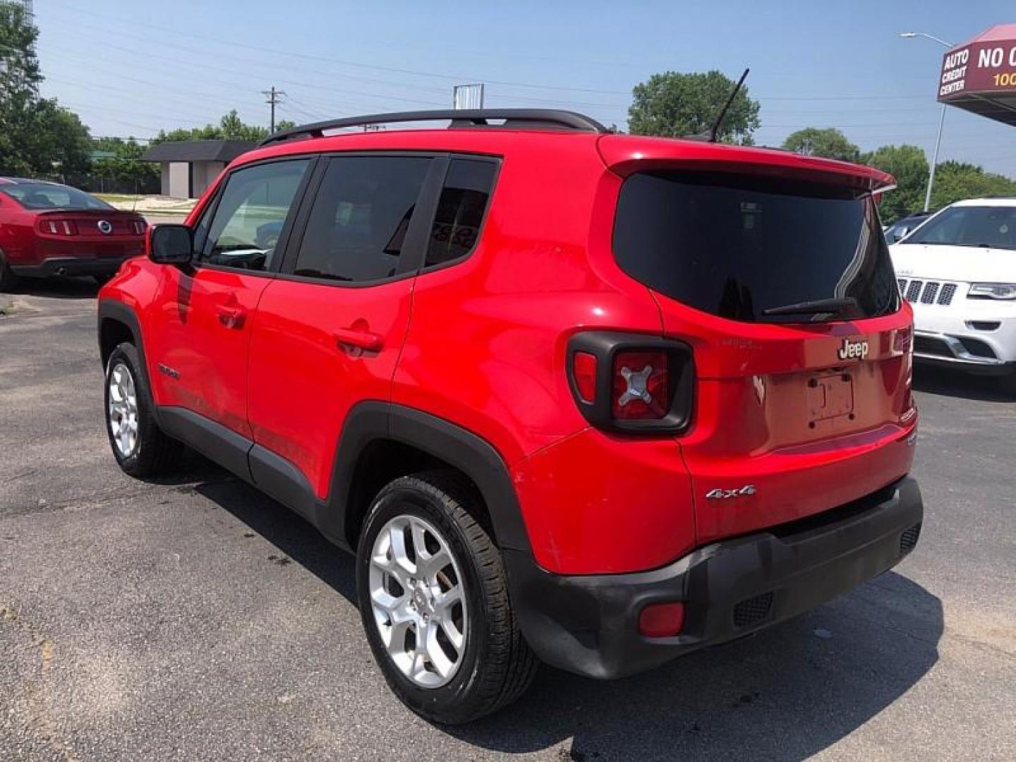 2017 RED /BLACK Jeep Renegade Latitude 4WD (ZACCJBBB0HP) with an 2.4L L4 DOHC 16V engine, 6M transmission, located at 3304 Woodville Road, Northwood, OH, 43619, (419) 210-8019, 41.612694, -83.480743 - Your #1 Destination for Auto Loans and mdash;No Matter Your Credit!At our dealership, we believe everyone deserves the opportunity to drive their dream car and mdash;whether you have good credit, bad credit, or no credit at all. With a wide selection of hundreds of cars, trucks, and SUVs, you'll fin - Photo#2