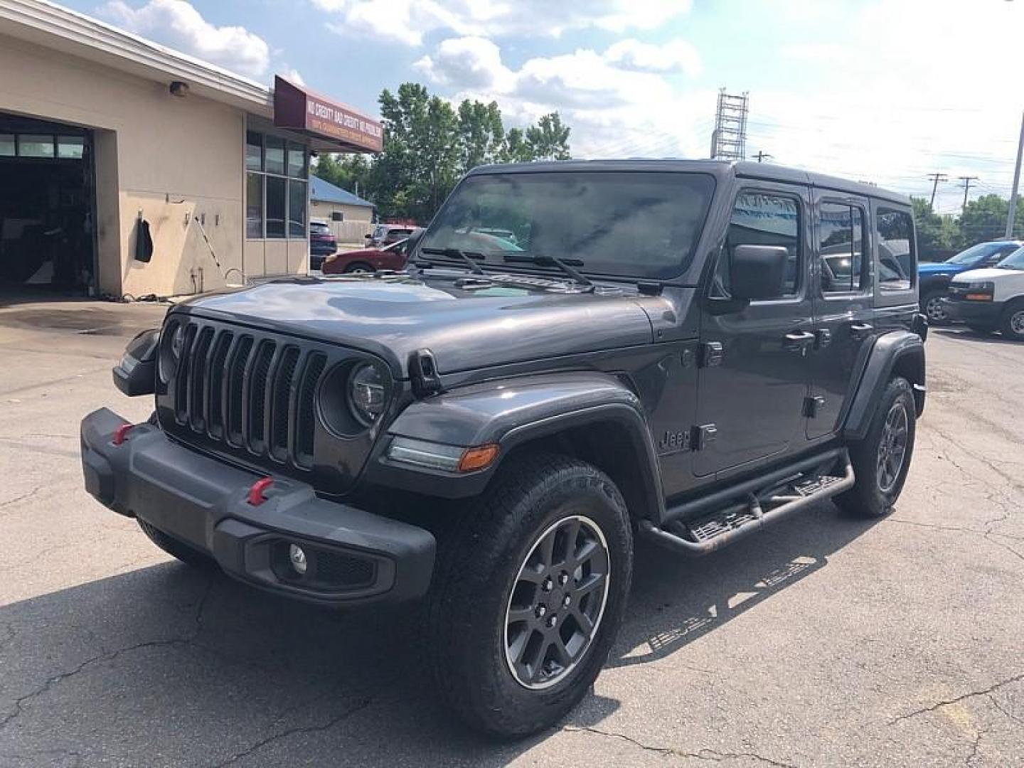 2021 GRAY /BLACK Jeep Wrangler Unlimited Sport (1C4HJXDNXMW) with an 2.0L L4 DOHC 16V TURBO engine, 6M transmission, located at 3304 Woodville Road, Northwood, OH, 43619, (419) 210-8019, 41.612694, -83.480743 - Your #1 Destination for Auto Loans and mdash;No Matter Your Credit!At our dealership, we believe everyone deserves the opportunity to drive their dream car and mdash;whether you have good credit, bad credit, or no credit at all. With a wide selection of hundreds of cars, trucks, and SUVs, you'll fin - Photo#0