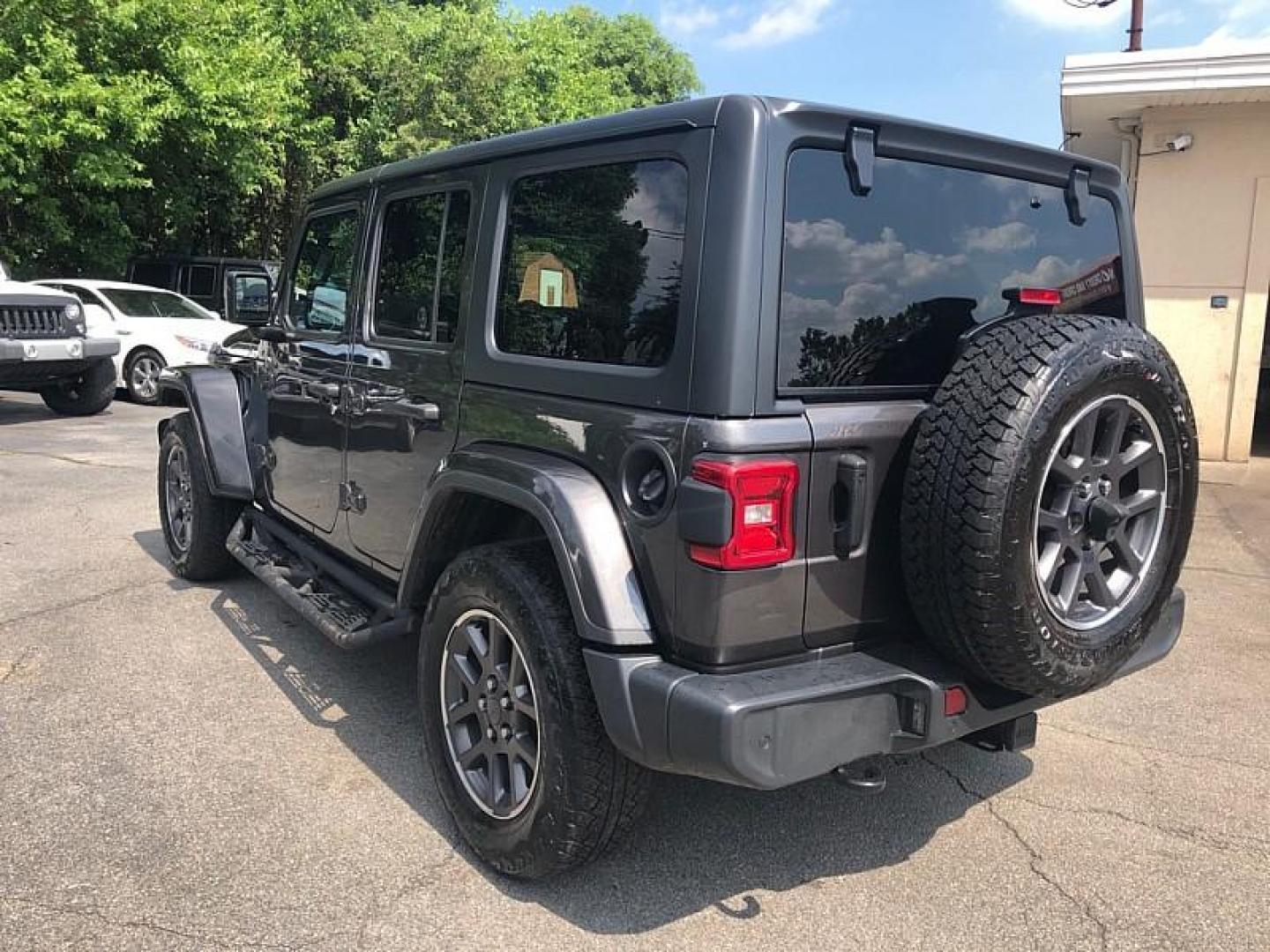 2021 GRAY /BLACK Jeep Wrangler Unlimited Sport (1C4HJXDNXMW) with an 2.0L L4 DOHC 16V TURBO engine, 6M transmission, located at 3304 Woodville Road, Northwood, OH, 43619, (419) 210-8019, 41.612694, -83.480743 - Your #1 Destination for Auto Loans and mdash;No Matter Your Credit!At our dealership, we believe everyone deserves the opportunity to drive their dream car and mdash;whether you have good credit, bad credit, or no credit at all. With a wide selection of hundreds of cars, trucks, and SUVs, you'll fin - Photo#2