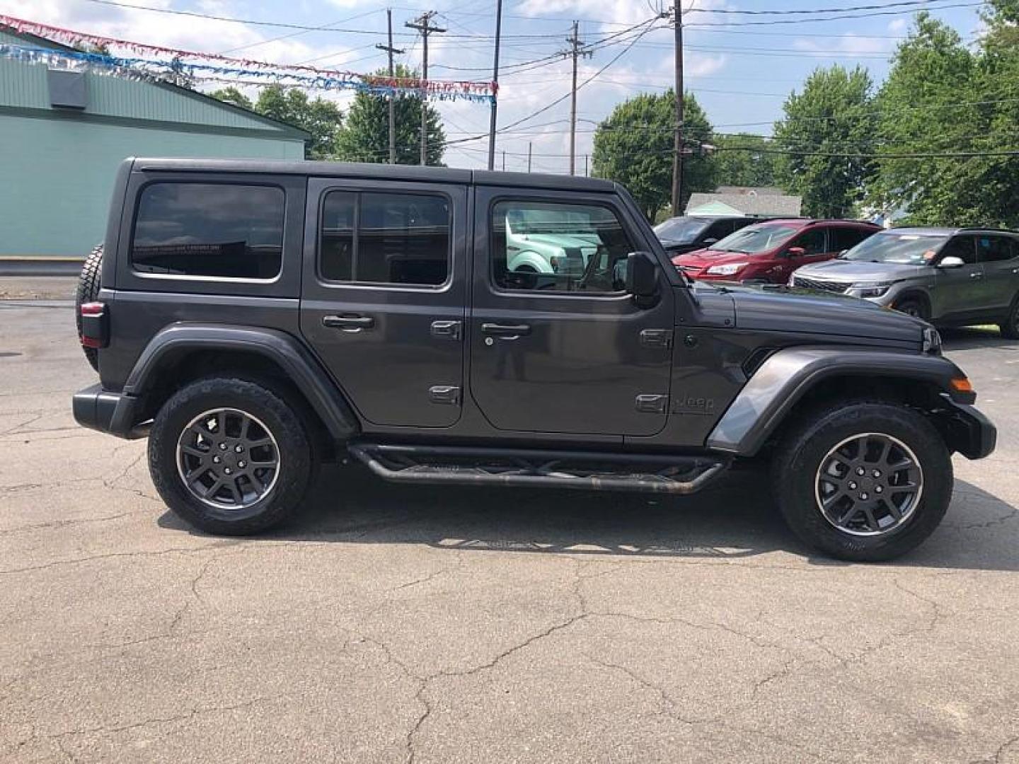 2021 GRAY /BLACK Jeep Wrangler Unlimited Sport (1C4HJXDNXMW) with an 2.0L L4 DOHC 16V TURBO engine, 6M transmission, located at 3304 Woodville Road, Northwood, OH, 43619, (419) 210-8019, 41.612694, -83.480743 - Your #1 Destination for Auto Loans and mdash;No Matter Your Credit!At our dealership, we believe everyone deserves the opportunity to drive their dream car and mdash;whether you have good credit, bad credit, or no credit at all. With a wide selection of hundreds of cars, trucks, and SUVs, you'll fin - Photo#5