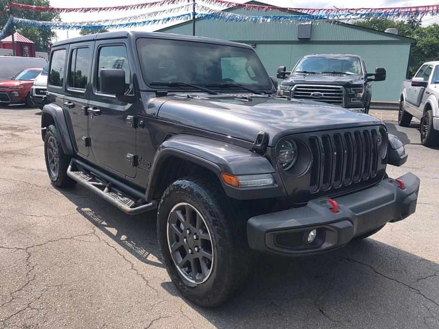 2021 GRAY /BLACK Jeep Wrangler Unlimited Sport (1C4HJXDNXMW) with an 2.0L L4 DOHC 16V TURBO engine, 6M transmission, located at 3304 Woodville Road, Northwood, OH, 43619, (419) 210-8019, 41.612694, -83.480743 - Your #1 Destination for Auto Loans and mdash;No Matter Your Credit!At our dealership, we believe everyone deserves the opportunity to drive their dream car and mdash;whether you have good credit, bad credit, or no credit at all. With a wide selection of hundreds of cars, trucks, and SUVs, you'll fin - Photo#6