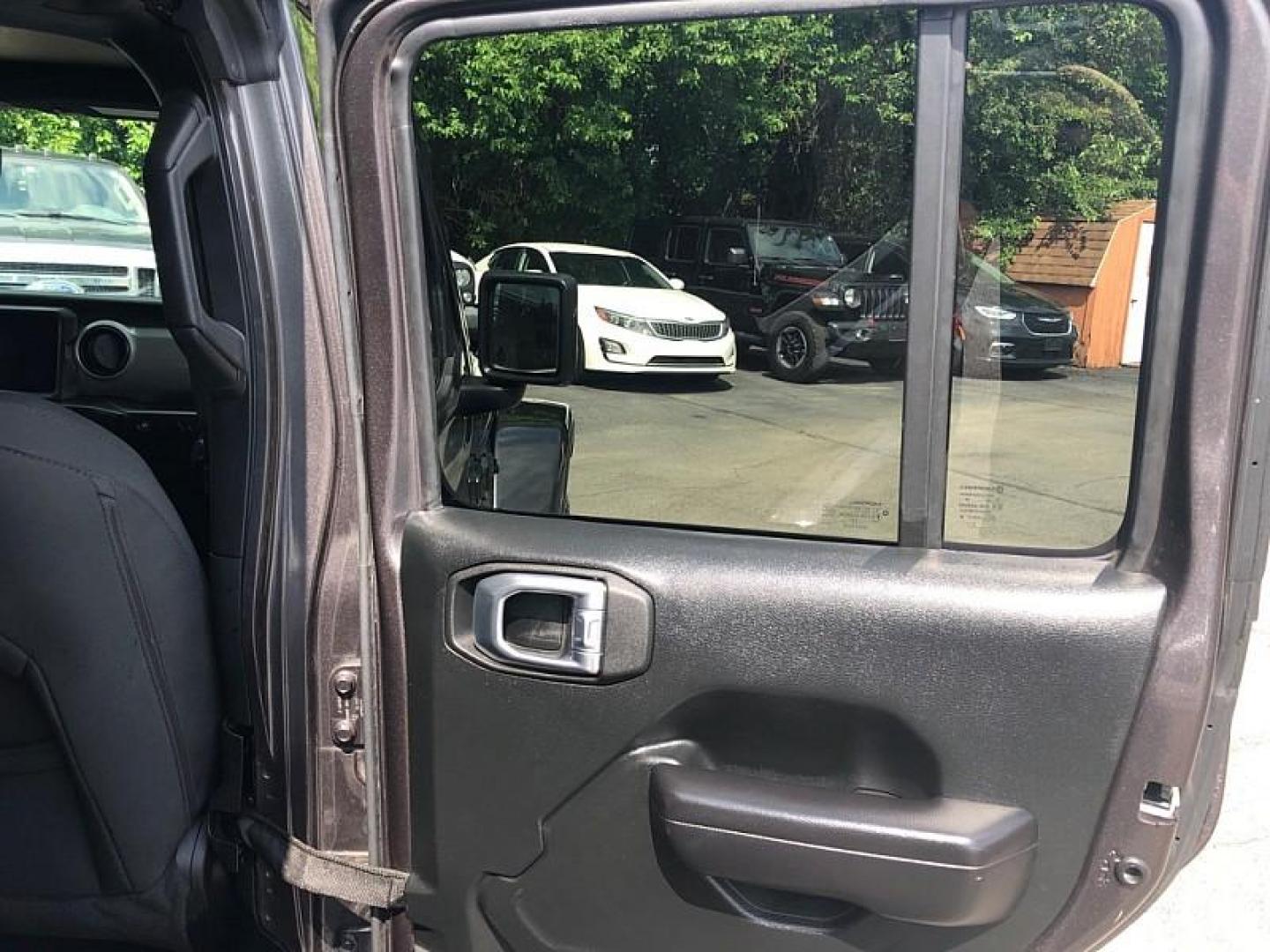 2021 GRAY /BLACK Jeep Wrangler Unlimited Sport (1C4HJXDNXMW) with an 2.0L L4 DOHC 16V TURBO engine, 6M transmission, located at 3304 Woodville Road, Northwood, OH, 43619, (419) 210-8019, 41.612694, -83.480743 - Your #1 Destination for Auto Loans and mdash;No Matter Your Credit!At our dealership, we believe everyone deserves the opportunity to drive their dream car and mdash;whether you have good credit, bad credit, or no credit at all. With a wide selection of hundreds of cars, trucks, and SUVs, you'll fin - Photo#13