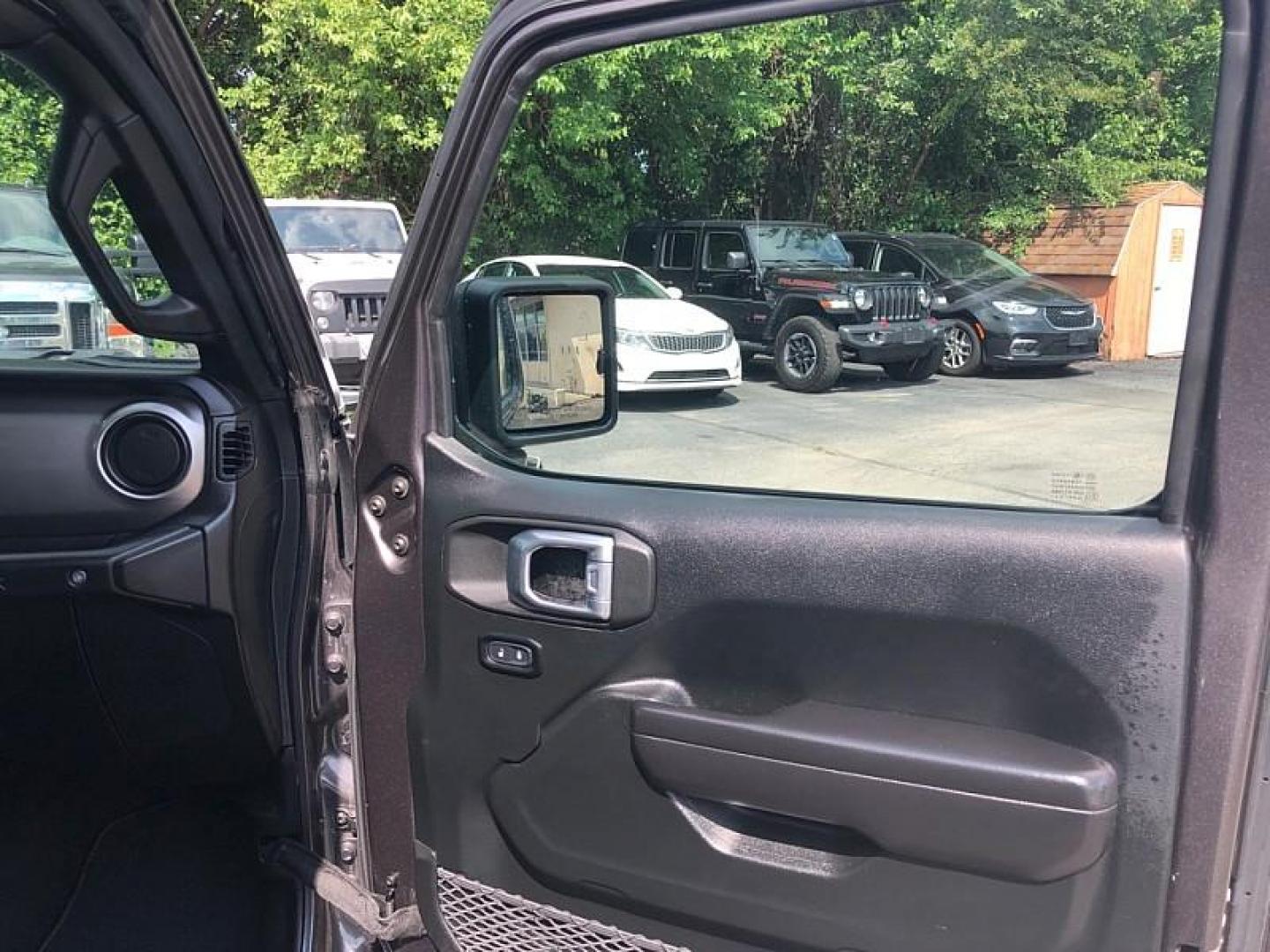 2021 GRAY /BLACK Jeep Wrangler Unlimited Sport (1C4HJXDNXMW) with an 2.0L L4 DOHC 16V TURBO engine, 6M transmission, located at 3304 Woodville Road, Northwood, OH, 43619, (419) 210-8019, 41.612694, -83.480743 - Your #1 Destination for Auto Loans and mdash;No Matter Your Credit!At our dealership, we believe everyone deserves the opportunity to drive their dream car and mdash;whether you have good credit, bad credit, or no credit at all. With a wide selection of hundreds of cars, trucks, and SUVs, you'll fin - Photo#15