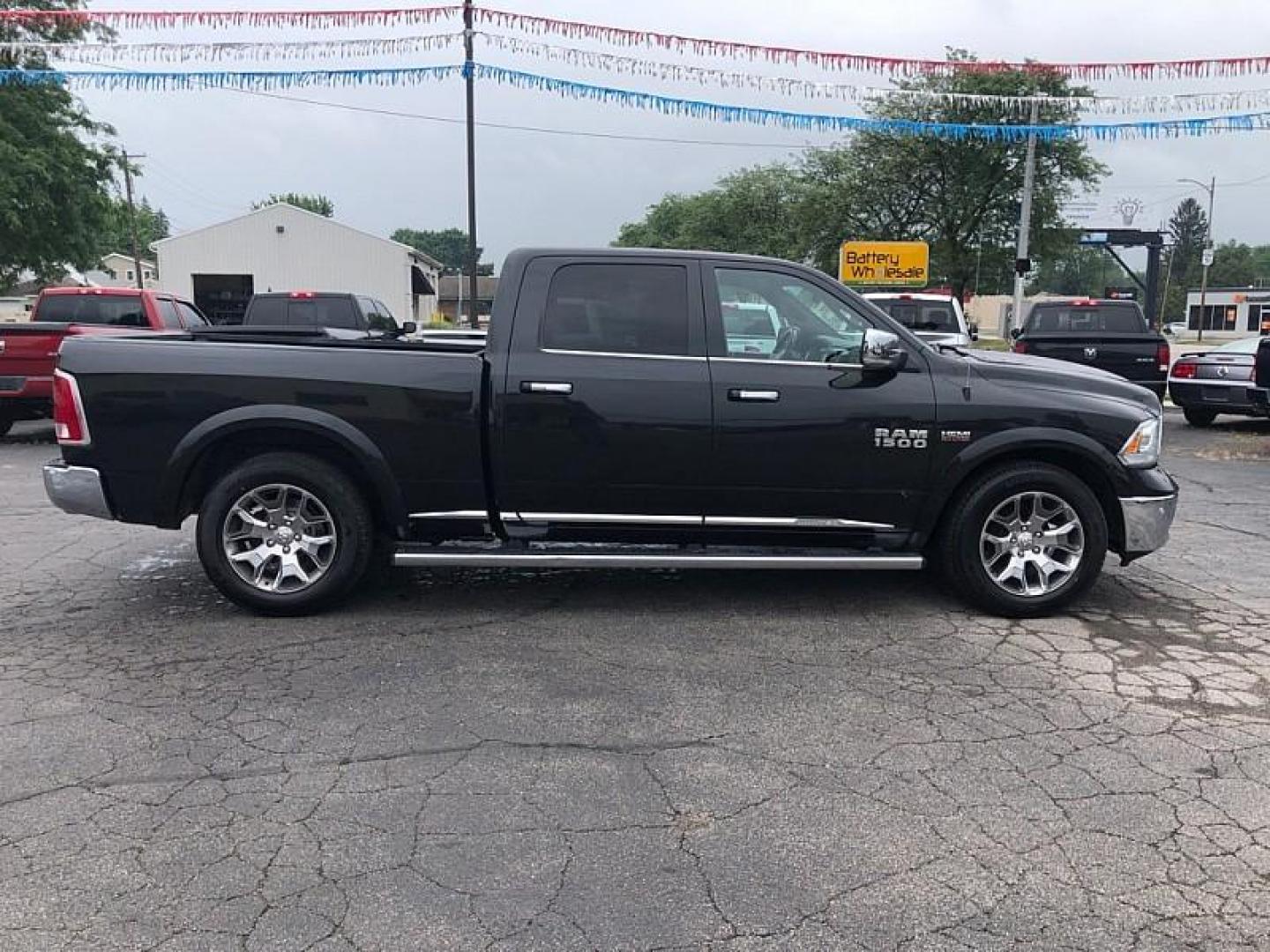 2017 BLACK /BLACK RAM 1500 Longhorn Crew Cab LWB 4WD (1C6RR7WT6HS) with an 5.7L V8 OHV 16V engine, 8A transmission, located at 3304 Woodville Road, Northwood, OH, 43619, (419) 210-8019, 41.612694, -83.480743 - Your #1 Destination for Auto Loans and mdash;No Matter Your Credit!At our dealership, we believe everyone deserves the opportunity to drive their dream car and mdash;whether you have good credit, bad credit, or no credit at all. With a wide selection of hundreds of cars, trucks, and SUVs, you'll fin - Photo#5