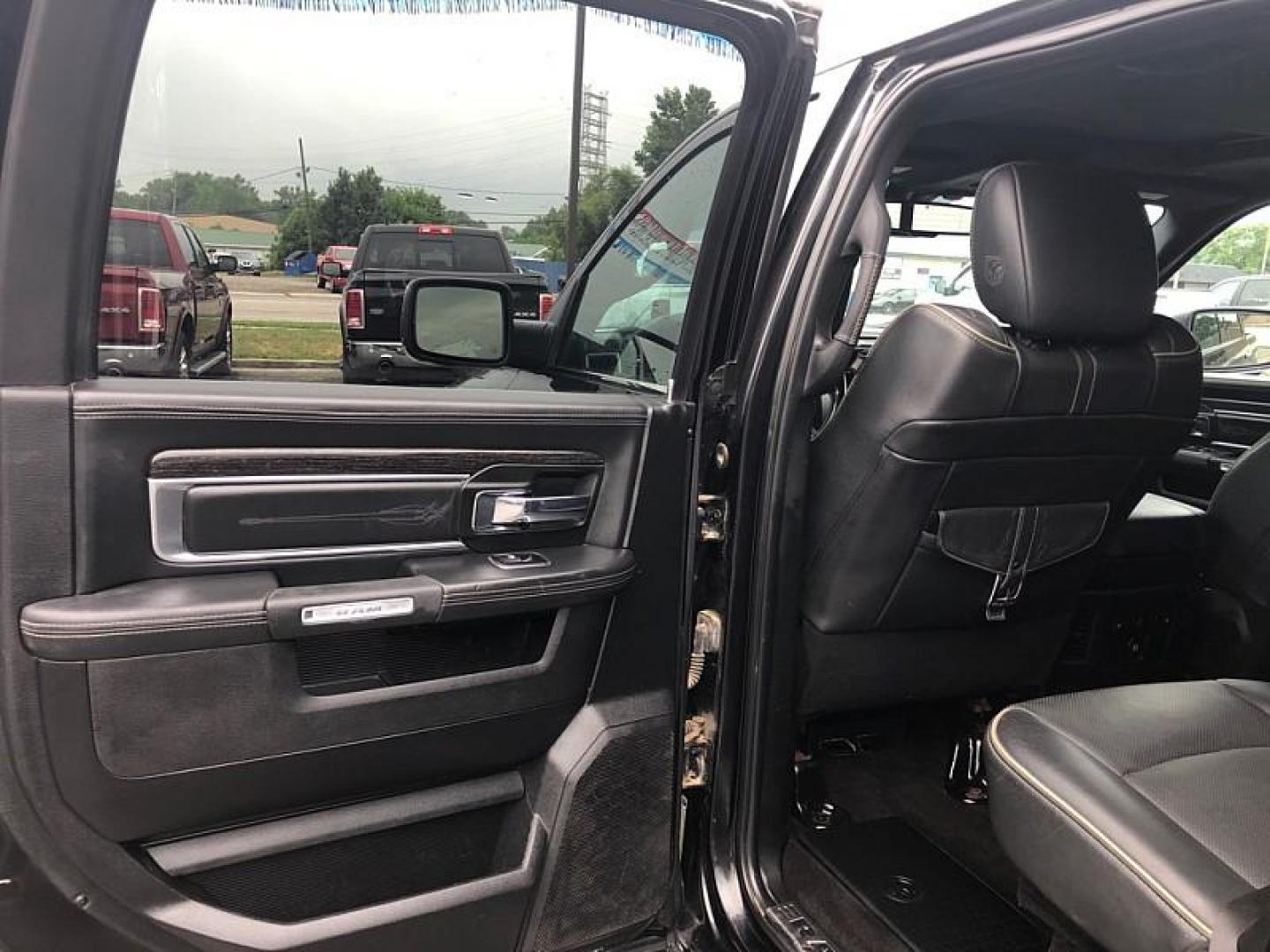 2017 BLACK /BLACK RAM 1500 Longhorn Crew Cab LWB 4WD (1C6RR7WT6HS) with an 5.7L V8 OHV 16V engine, 8A transmission, located at 3304 Woodville Road, Northwood, OH, 43619, (419) 210-8019, 41.612694, -83.480743 - Your #1 Destination for Auto Loans and mdash;No Matter Your Credit!At our dealership, we believe everyone deserves the opportunity to drive their dream car and mdash;whether you have good credit, bad credit, or no credit at all. With a wide selection of hundreds of cars, trucks, and SUVs, you'll fin - Photo#10