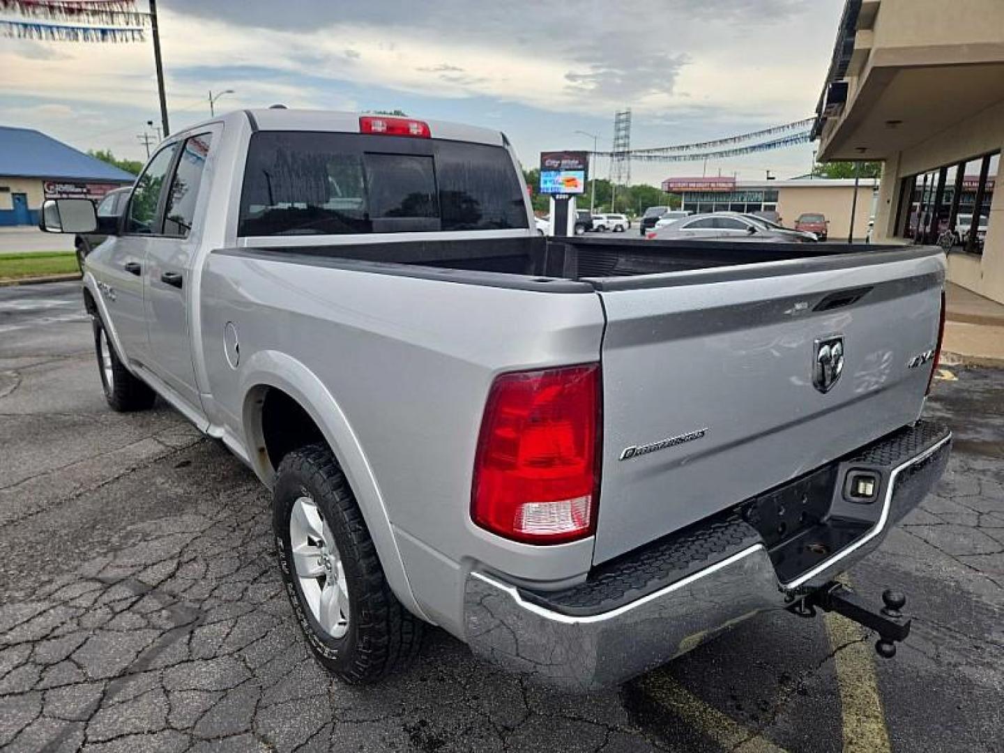 2017 SILVER RAM 1500 SLT Quad Cab 4WD (1C6RR7GT0HS) with an 5.7L V8 OHV 16V engine, 8A transmission, located at 3304 Woodville Road, Northwood, OH, 43619, (419) 210-8019, 41.612694, -83.480743 - Your #1 Destination for Auto Loans and mdash;No Matter Your Credit!At our dealership, we believe everyone deserves the opportunity to drive their dream car and mdash;whether you have good credit, bad credit, or no credit at all. With a wide selection of hundreds of cars, trucks, and SUVs, you'll fin - Photo#2
