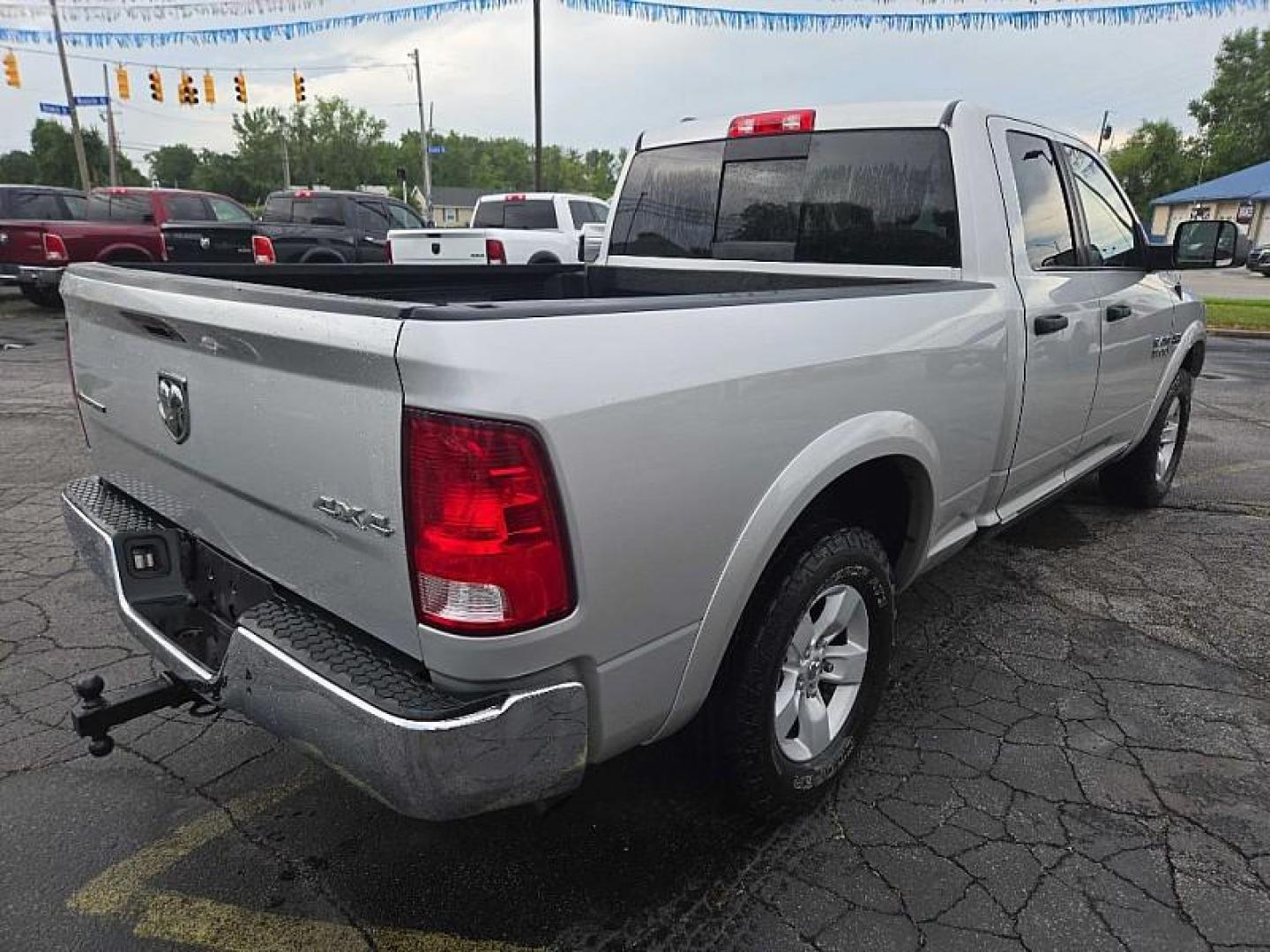 2017 SILVER RAM 1500 SLT Quad Cab 4WD (1C6RR7GT0HS) with an 5.7L V8 OHV 16V engine, 8A transmission, located at 3304 Woodville Road, Northwood, OH, 43619, (419) 210-8019, 41.612694, -83.480743 - Your #1 Destination for Auto Loans and mdash;No Matter Your Credit!At our dealership, we believe everyone deserves the opportunity to drive their dream car and mdash;whether you have good credit, bad credit, or no credit at all. With a wide selection of hundreds of cars, trucks, and SUVs, you'll fin - Photo#4