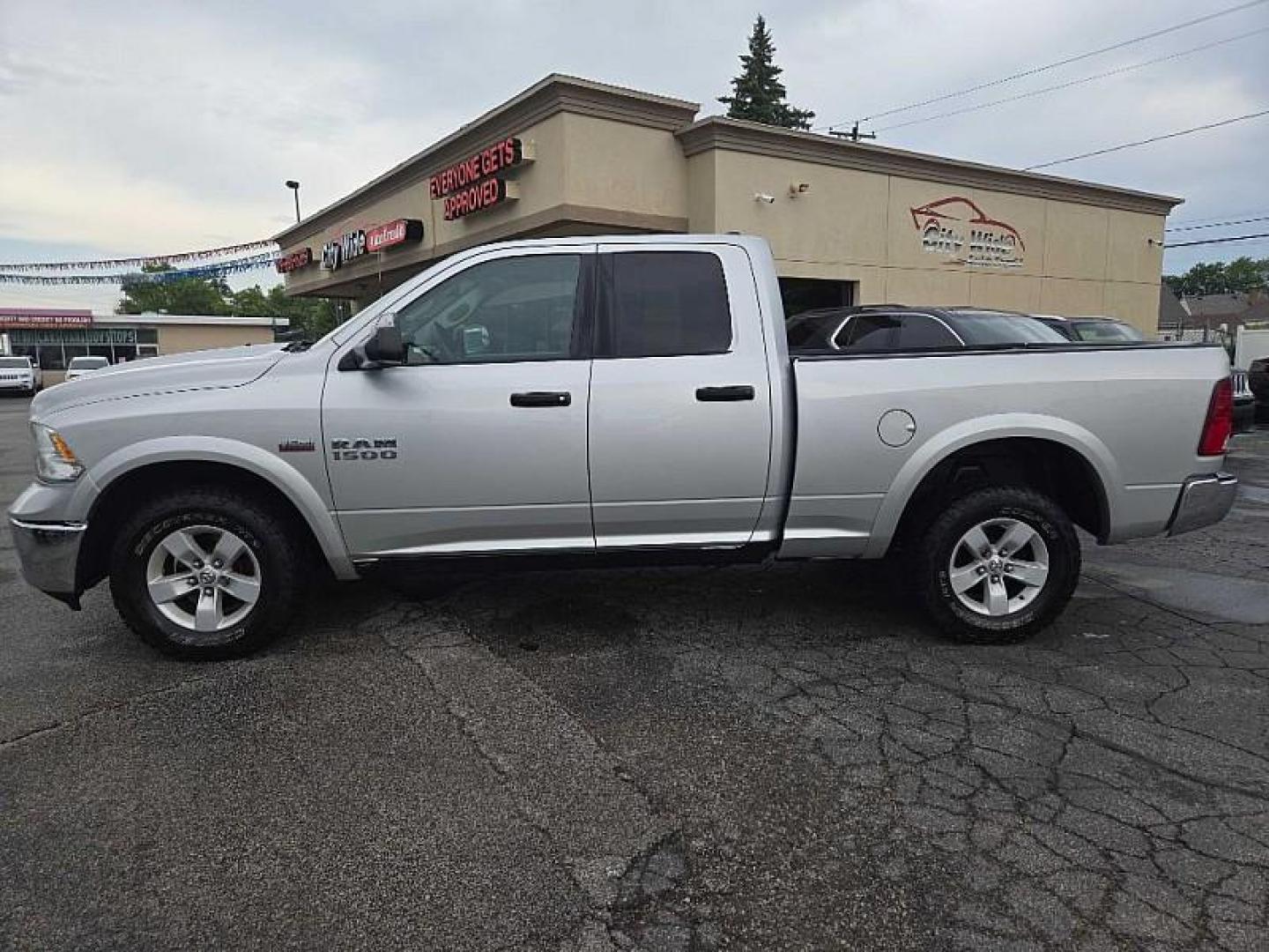 2017 SILVER RAM 1500 SLT Quad Cab 4WD (1C6RR7GT0HS) with an 5.7L V8 OHV 16V engine, 8A transmission, located at 3304 Woodville Road, Northwood, OH, 43619, (419) 210-8019, 41.612694, -83.480743 - Your #1 Destination for Auto Loans and mdash;No Matter Your Credit!At our dealership, we believe everyone deserves the opportunity to drive their dream car and mdash;whether you have good credit, bad credit, or no credit at all. With a wide selection of hundreds of cars, trucks, and SUVs, you'll fin - Photo#1