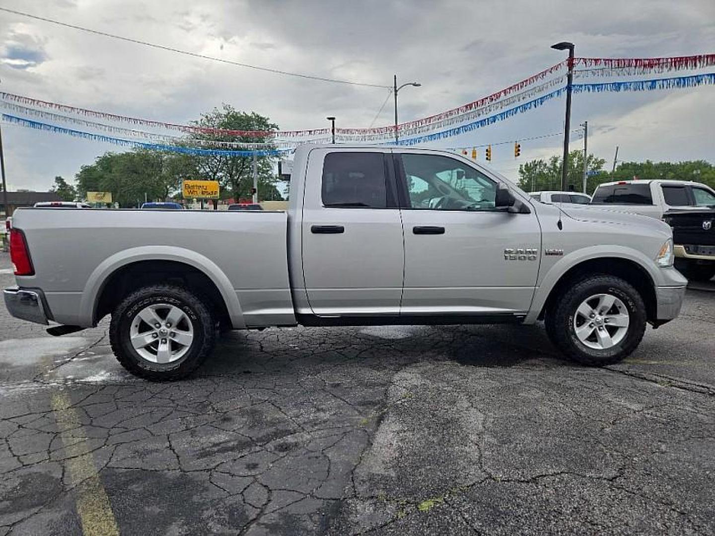 2017 SILVER RAM 1500 SLT Quad Cab 4WD (1C6RR7GT0HS) with an 5.7L V8 OHV 16V engine, 8A transmission, located at 3304 Woodville Road, Northwood, OH, 43619, (419) 210-8019, 41.612694, -83.480743 - Your #1 Destination for Auto Loans and mdash;No Matter Your Credit!At our dealership, we believe everyone deserves the opportunity to drive their dream car and mdash;whether you have good credit, bad credit, or no credit at all. With a wide selection of hundreds of cars, trucks, and SUVs, you'll fin - Photo#5
