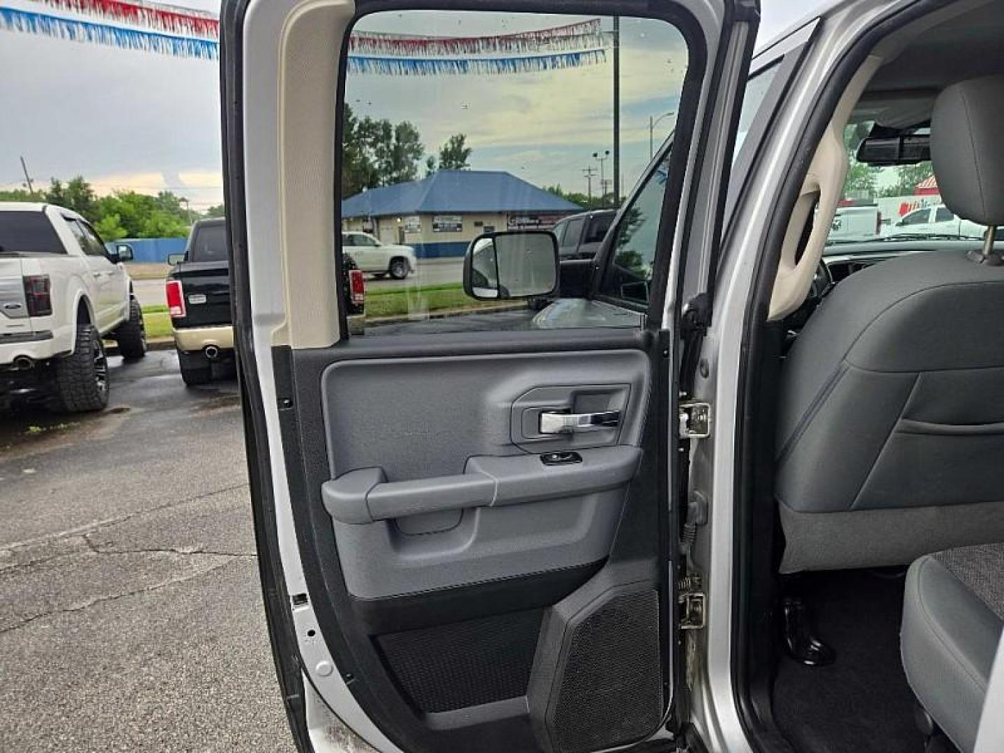 2017 SILVER RAM 1500 SLT Quad Cab 4WD (1C6RR7GT0HS) with an 5.7L V8 OHV 16V engine, 8A transmission, located at 3304 Woodville Road, Northwood, OH, 43619, (419) 210-8019, 41.612694, -83.480743 - Your #1 Destination for Auto Loans and mdash;No Matter Your Credit!At our dealership, we believe everyone deserves the opportunity to drive their dream car and mdash;whether you have good credit, bad credit, or no credit at all. With a wide selection of hundreds of cars, trucks, and SUVs, you'll fin - Photo#10