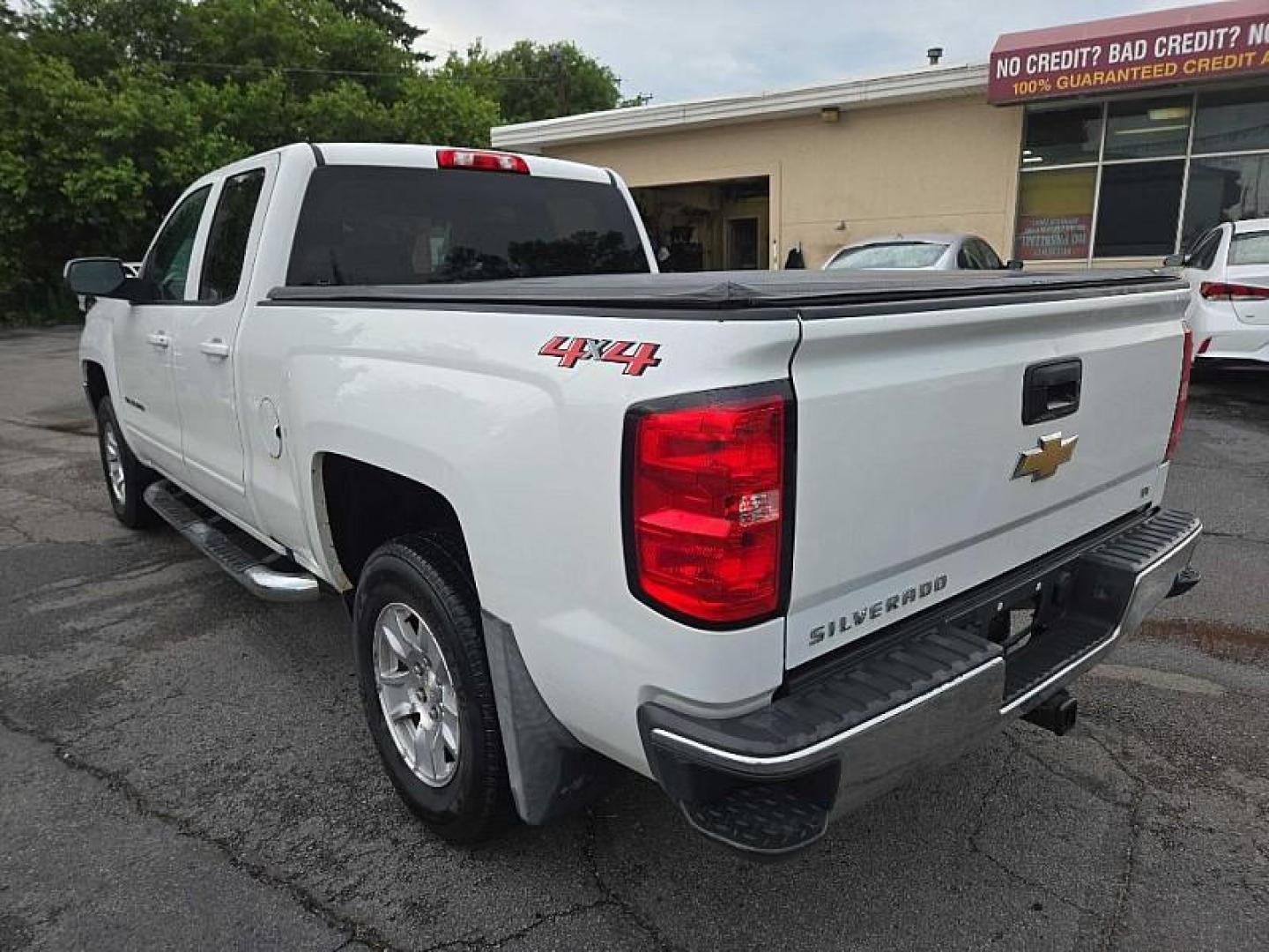 2018 WHITE Chevrolet Silverado 1500 LT Double Cab 4WD (1GCVKREC1JZ) with an 5.3L V8 OHV 16V engine, 6A transmission, located at 3304 Woodville Road, Northwood, OH, 43619, (419) 210-8019, 41.612694, -83.480743 - Your #1 Destination for Auto Loans and mdash;No Matter Your Credit!At our dealership, we believe everyone deserves the opportunity to drive their dream car and mdash;whether you have good credit, bad credit, or no credit at all. With a wide selection of hundreds of cars, trucks, and SUVs, you'll fin - Photo#2