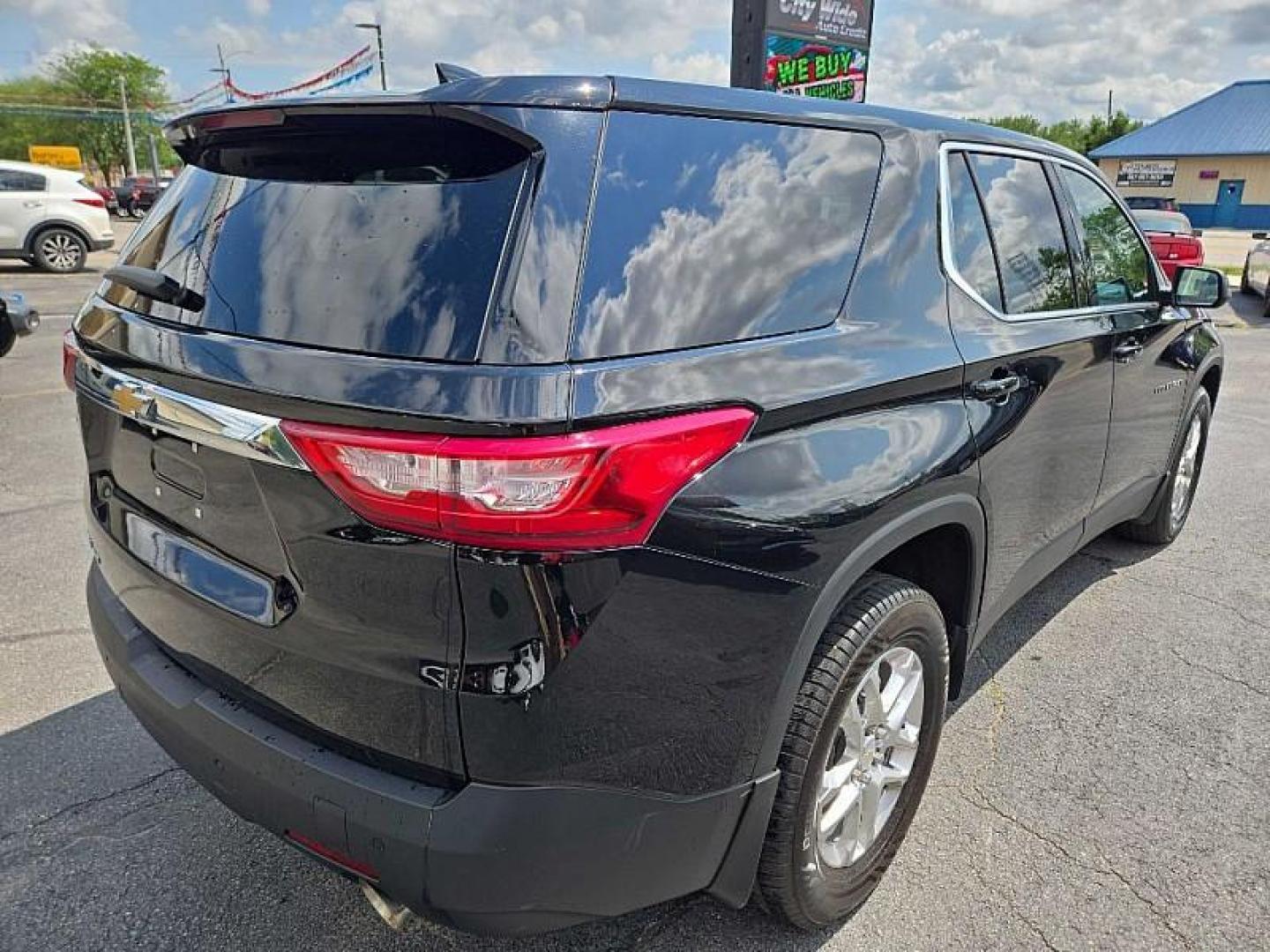 2021 BLACK /BLACK Chevrolet Traverse LS FL AWD (1GNEVLKW5MJ) with an 3.6L V6 DOHC 24V engine, 9A transmission, located at 3304 Woodville Road, Northwood, OH, 43619, (419) 210-8019, 41.612694, -83.480743 - Your #1 Destination for Auto Loans and mdash;No Matter Your Credit!At our dealership, we believe everyone deserves the opportunity to drive their dream car and mdash;whether you have good credit, bad credit, or no credit at all. With a wide selection of hundreds of cars, trucks, and SUVs, you'll fin - Photo#4