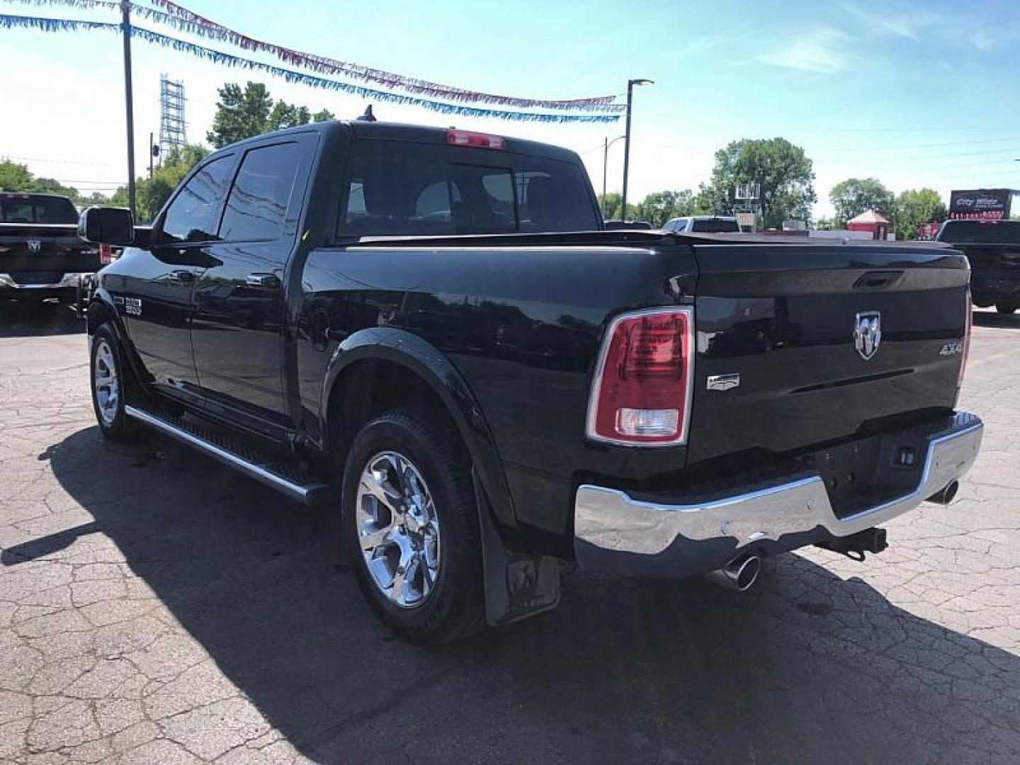 2018 SILVER /BLACK RAM 1500 Laramie Crew Cab SWB 4WD (1C6RR7NM6JS) with an 3.0L V6 DIESEL engine, 8A transmission, located at 3304 Woodville Road, Northwood, OH, 43619, (419) 210-8019, 41.612694, -83.480743 - Your #1 Destination for Auto Loans and mdash;No Matter Your Credit!At our dealership, we believe everyone deserves the opportunity to drive their dream car and mdash;whether you have good credit, bad credit, or no credit at all. With a wide selection of hundreds of cars, trucks, and SUVs, you'll fin - Photo#2