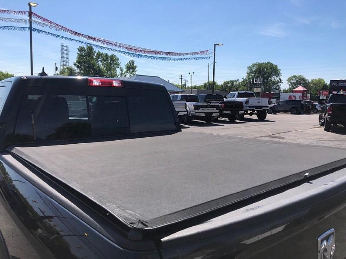 2018 SILVER /BLACK RAM 1500 Laramie Crew Cab SWB 4WD (1C6RR7NM6JS) with an 3.0L V6 DIESEL engine, 8A transmission, located at 3304 Woodville Road, Northwood, OH, 43619, (419) 210-8019, 41.612694, -83.480743 - Your #1 Destination for Auto Loans and mdash;No Matter Your Credit!At our dealership, we believe everyone deserves the opportunity to drive their dream car and mdash;whether you have good credit, bad credit, or no credit at all. With a wide selection of hundreds of cars, trucks, and SUVs, you'll fin - Photo#12