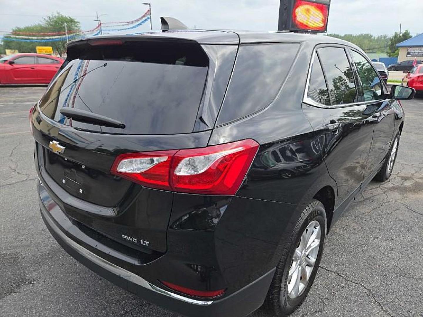 2019 BLACK /BLACK Chevrolet Equinox LT AWD (2GNAXUEV6K6) with an 1.5L L4 DOHC 16V TURBO engine, 6A transmission, located at 3304 Woodville Road, Northwood, OH, 43619, (419) 210-8019, 41.612694, -83.480743 - Your #1 Destination for Auto Loans and mdash;No Matter Your Credit!At our dealership, we believe everyone deserves the opportunity to drive their dream car and mdash;whether you have good credit, bad credit, or no credit at all. With a wide selection of hundreds of cars, trucks, and SUVs, you'll fin - Photo#4