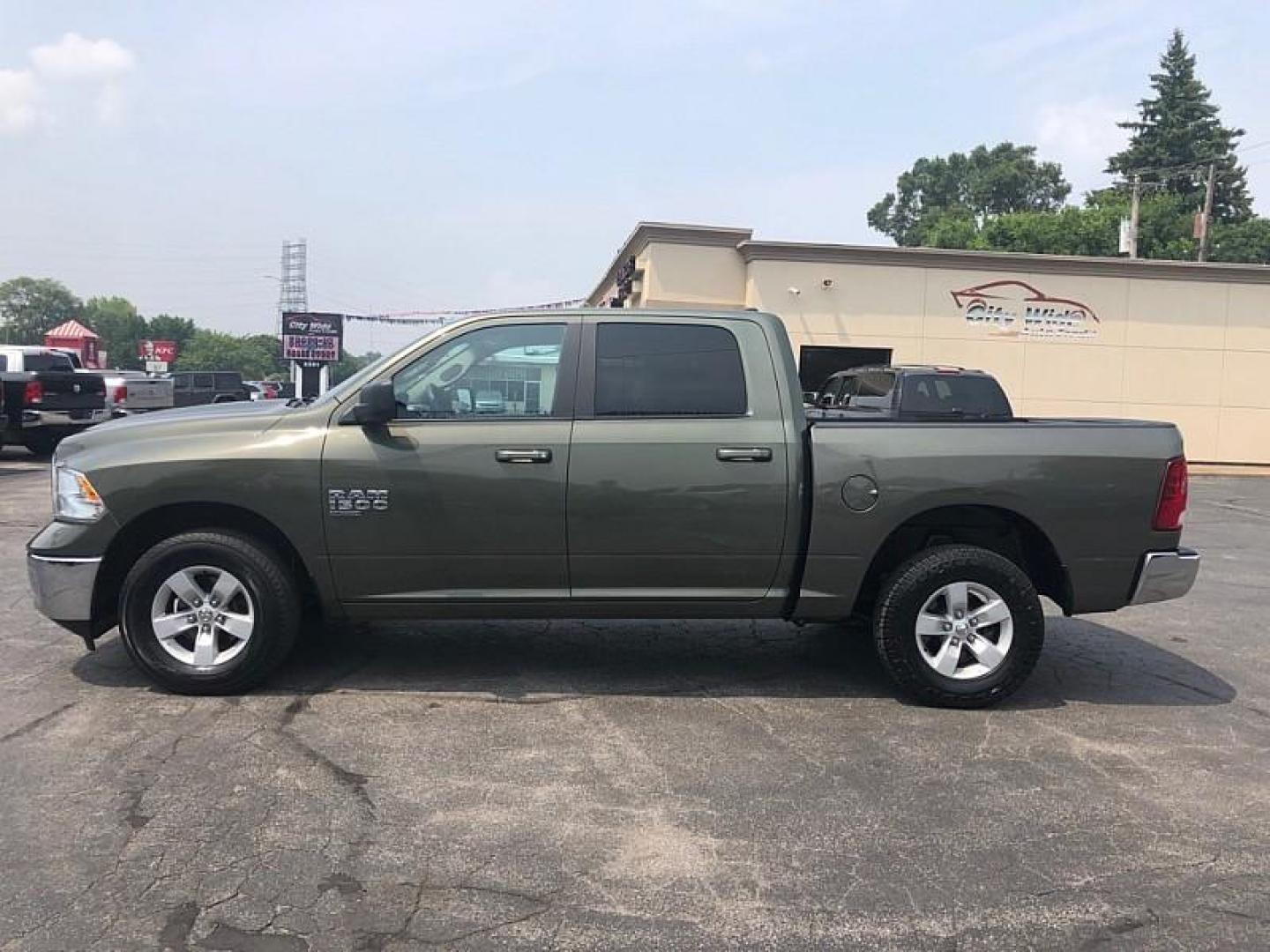 2021 GREEN /GRAY RAM 1500 Classic Tradesman Crew Cab SWB 4WD (1C6RR7LG3MS) with an 3.6L V6 DOHC 24V FFV engine, 8A transmission, located at 3304 Woodville Road, Northwood, OH, 43619, (419) 210-8019, 41.612694, -83.480743 - Your #1 Destination for Auto Loans and mdash;No Matter Your Credit!At our dealership, we believe everyone deserves the opportunity to drive their dream car and mdash;whether you have good credit, bad credit, or no credit at all. With a wide selection of hundreds of cars, trucks, and SUVs, you'll fin - Photo#1
