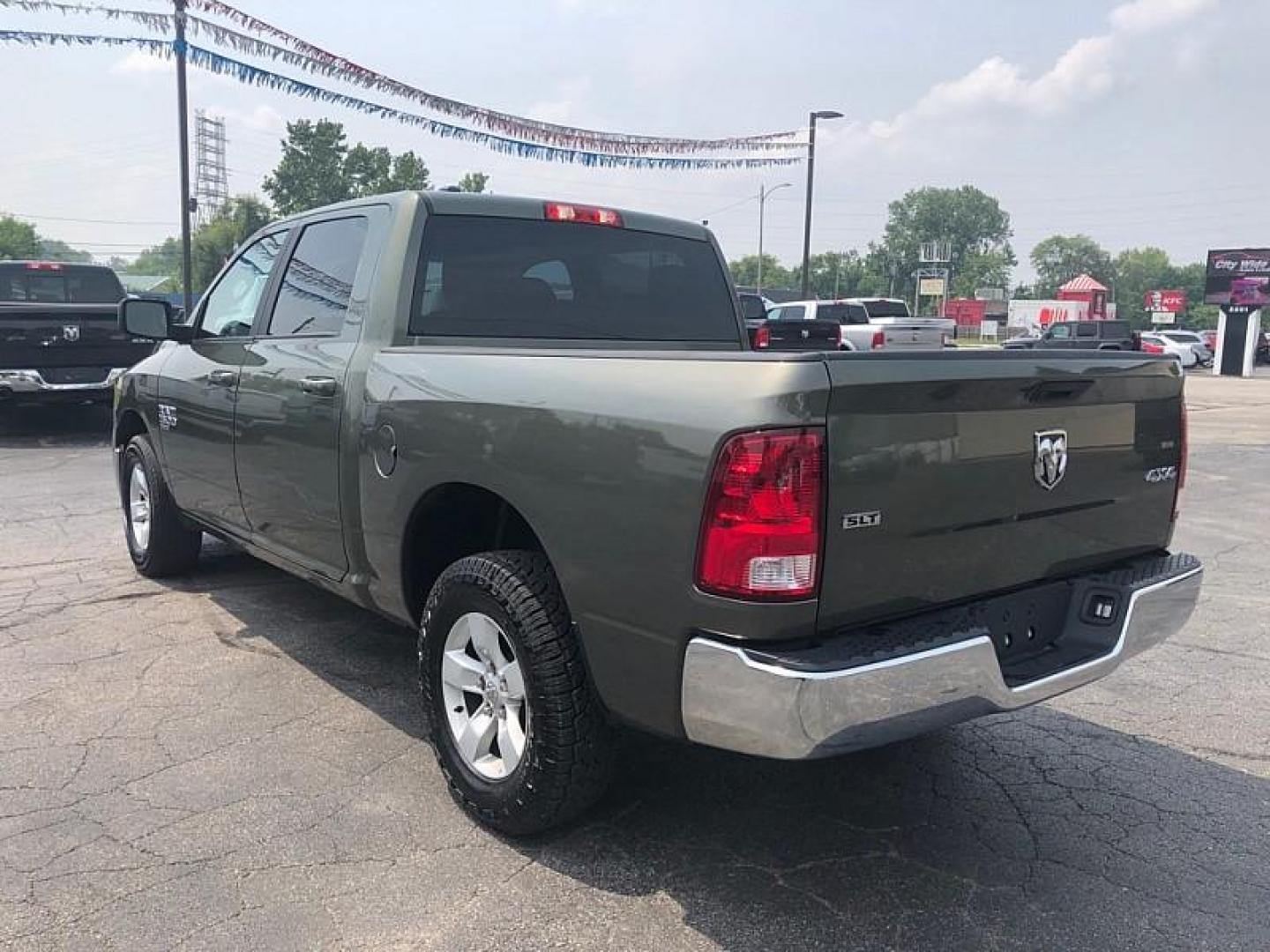 2021 GREEN /GRAY RAM 1500 Classic Tradesman Crew Cab SWB 4WD (1C6RR7LG3MS) with an 3.6L V6 DOHC 24V FFV engine, 8A transmission, located at 3304 Woodville Road, Northwood, OH, 43619, (419) 210-8019, 41.612694, -83.480743 - Your #1 Destination for Auto Loans and mdash;No Matter Your Credit!At our dealership, we believe everyone deserves the opportunity to drive their dream car and mdash;whether you have good credit, bad credit, or no credit at all. With a wide selection of hundreds of cars, trucks, and SUVs, you'll fin - Photo#2