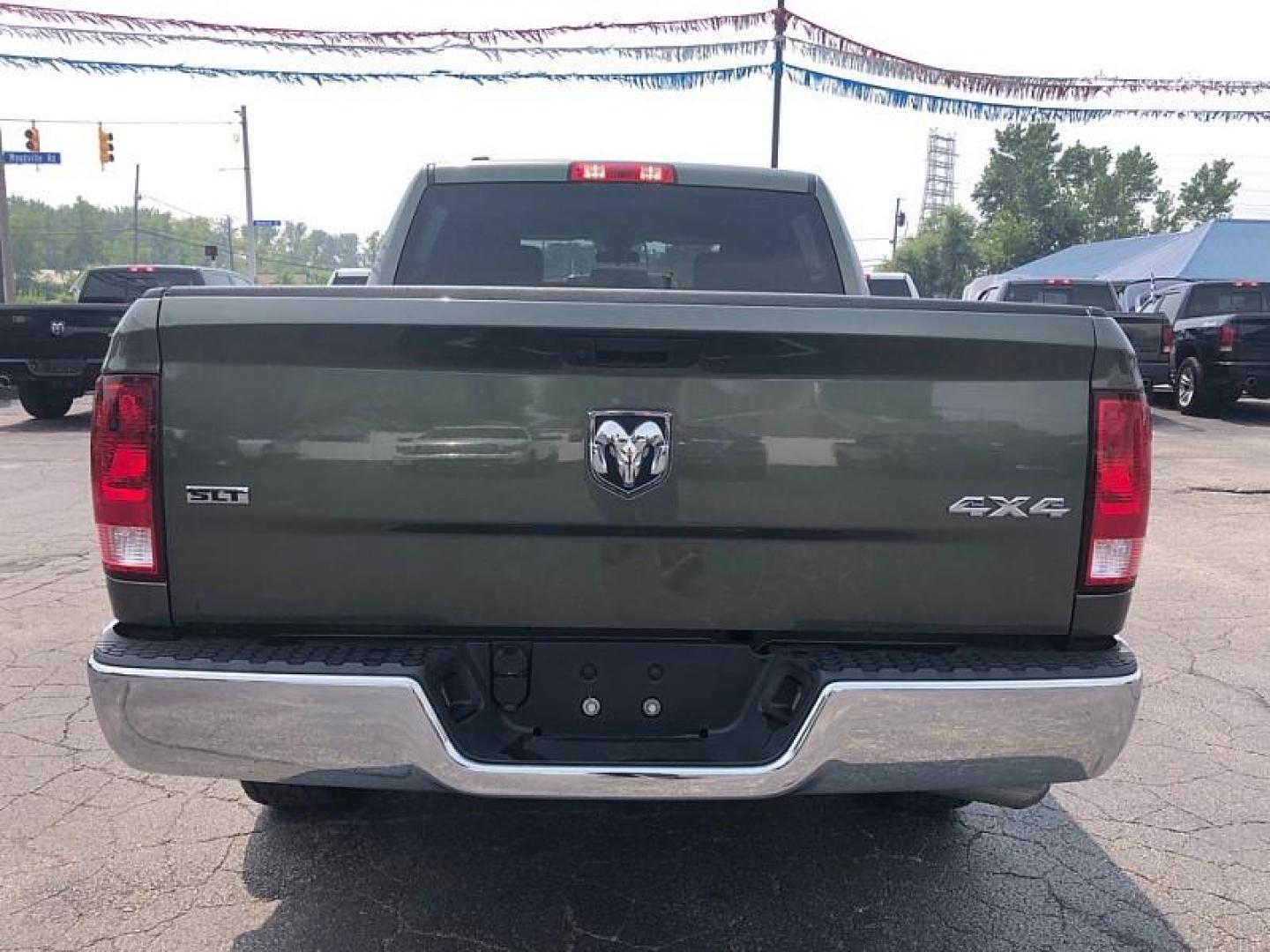 2021 GREEN /GRAY RAM 1500 Classic Tradesman Crew Cab SWB 4WD (1C6RR7LG3MS) with an 3.6L V6 DOHC 24V FFV engine, 8A transmission, located at 3304 Woodville Road, Northwood, OH, 43619, (419) 210-8019, 41.612694, -83.480743 - Your #1 Destination for Auto Loans and mdash;No Matter Your Credit!At our dealership, we believe everyone deserves the opportunity to drive their dream car and mdash;whether you have good credit, bad credit, or no credit at all. With a wide selection of hundreds of cars, trucks, and SUVs, you'll fin - Photo#3