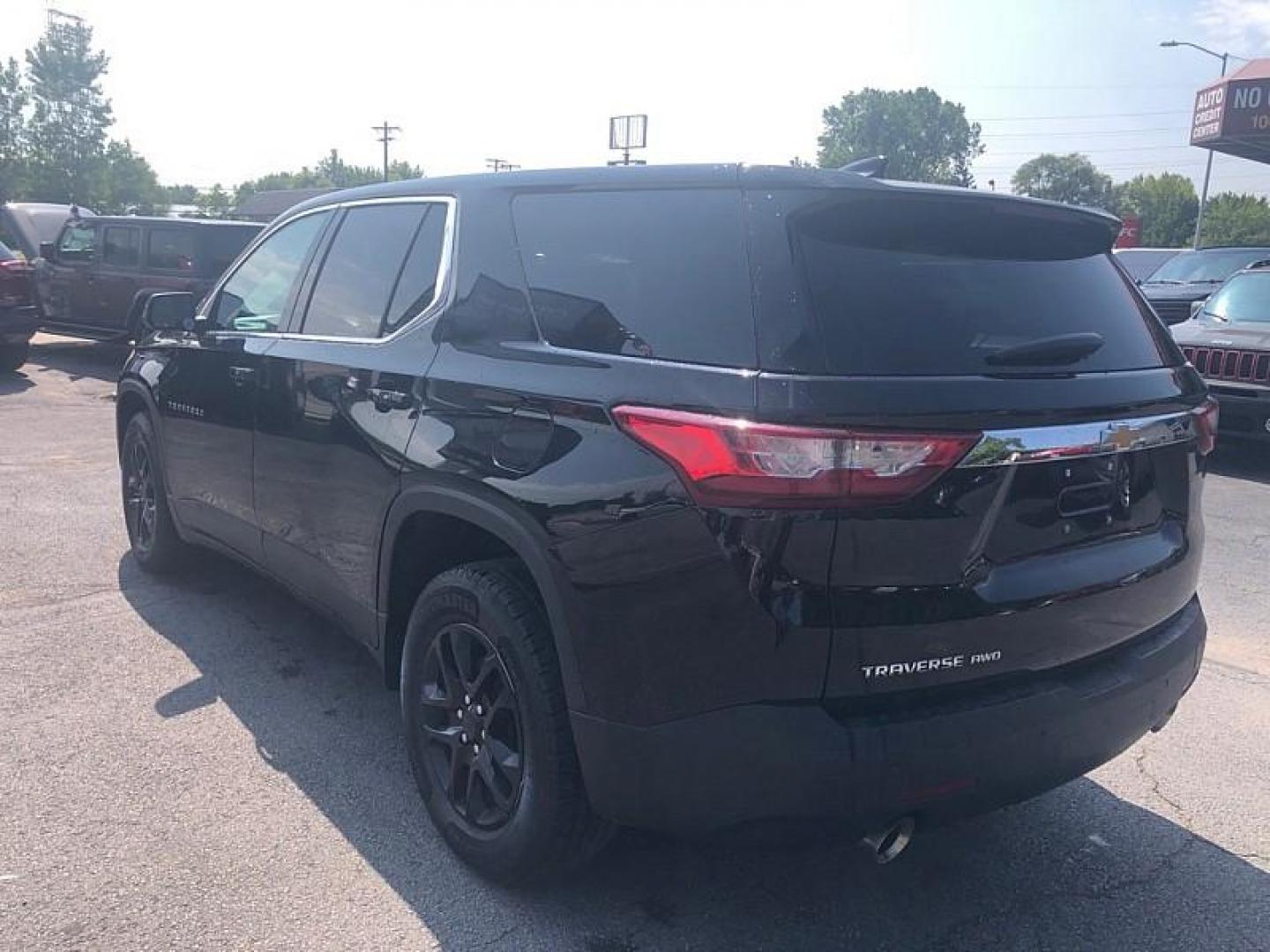 2021 BLACK /BLACK Chevrolet Traverse LS FL AWD (1GNEVLKW3MJ) with an 3.6L V6 DOHC 24V engine, 9A transmission, located at 3304 Woodville Road, Northwood, OH, 43619, (419) 210-8019, 41.612694, -83.480743 - Photo#2