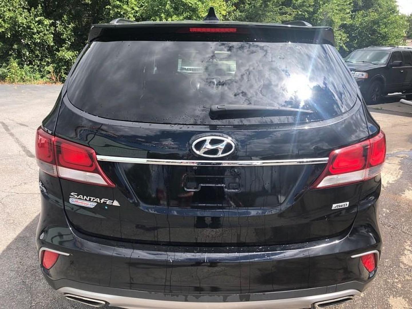 2017 BLACK /BLACK Hyundai Santa Fe SE AWD (KM8SMDHF6HU) with an 3.3L V6 DOHC 24V engine, 6A transmission, located at 3304 Woodville Road, Northwood, OH, 43619, (419) 210-8019, 41.612694, -83.480743 - Your #1 Destination for Auto Loans and mdash;No Matter Your Credit!At our dealership, we believe everyone deserves the opportunity to drive their dream car and mdash;whether you have good credit, bad credit, or no credit at all. With a wide selection of hundreds of cars, trucks, and SUVs, you'll fin - Photo#3